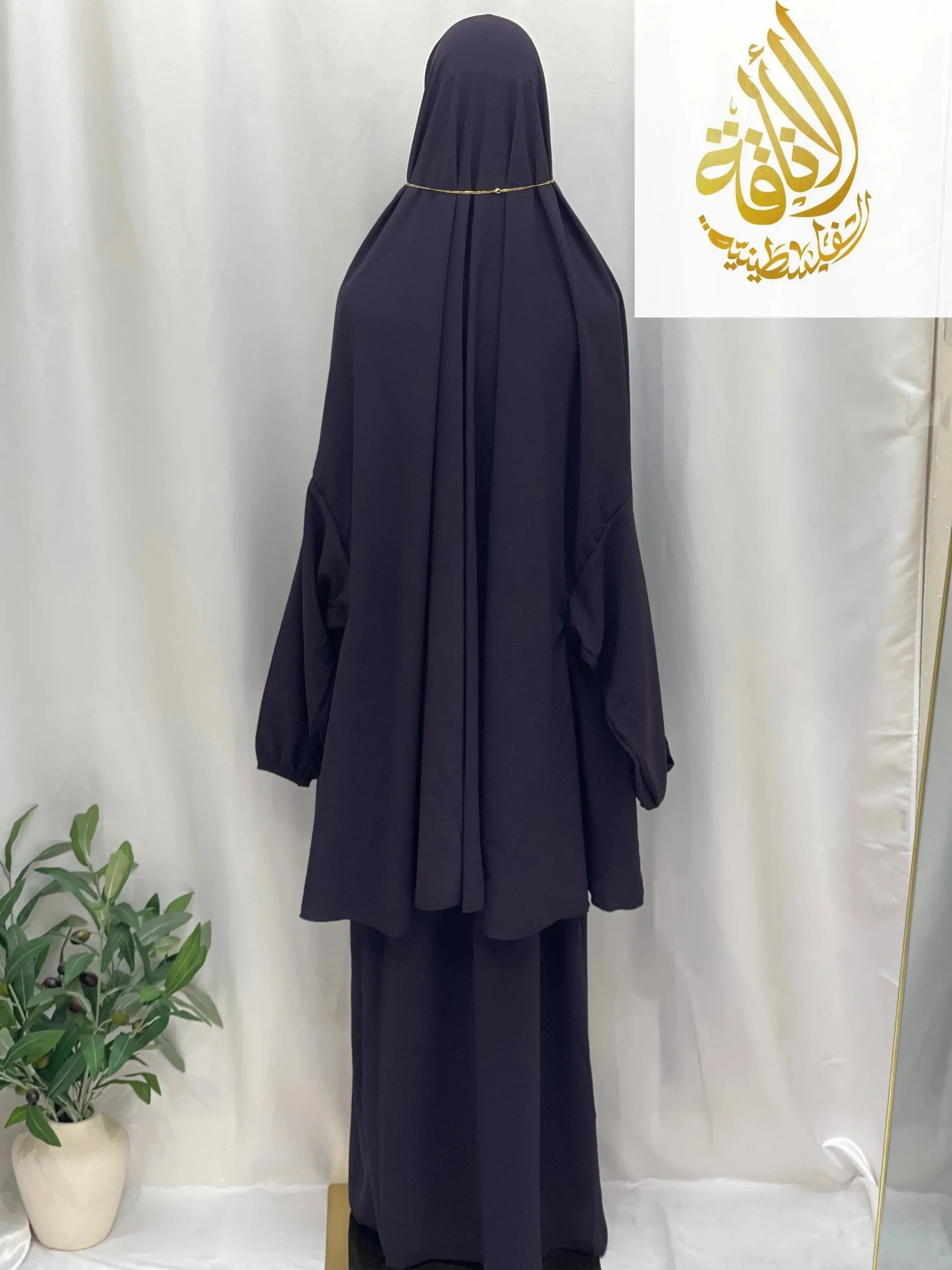 Palestinian Elegance two piece prayer outfit in dark navy with loose fitting long top and skirt