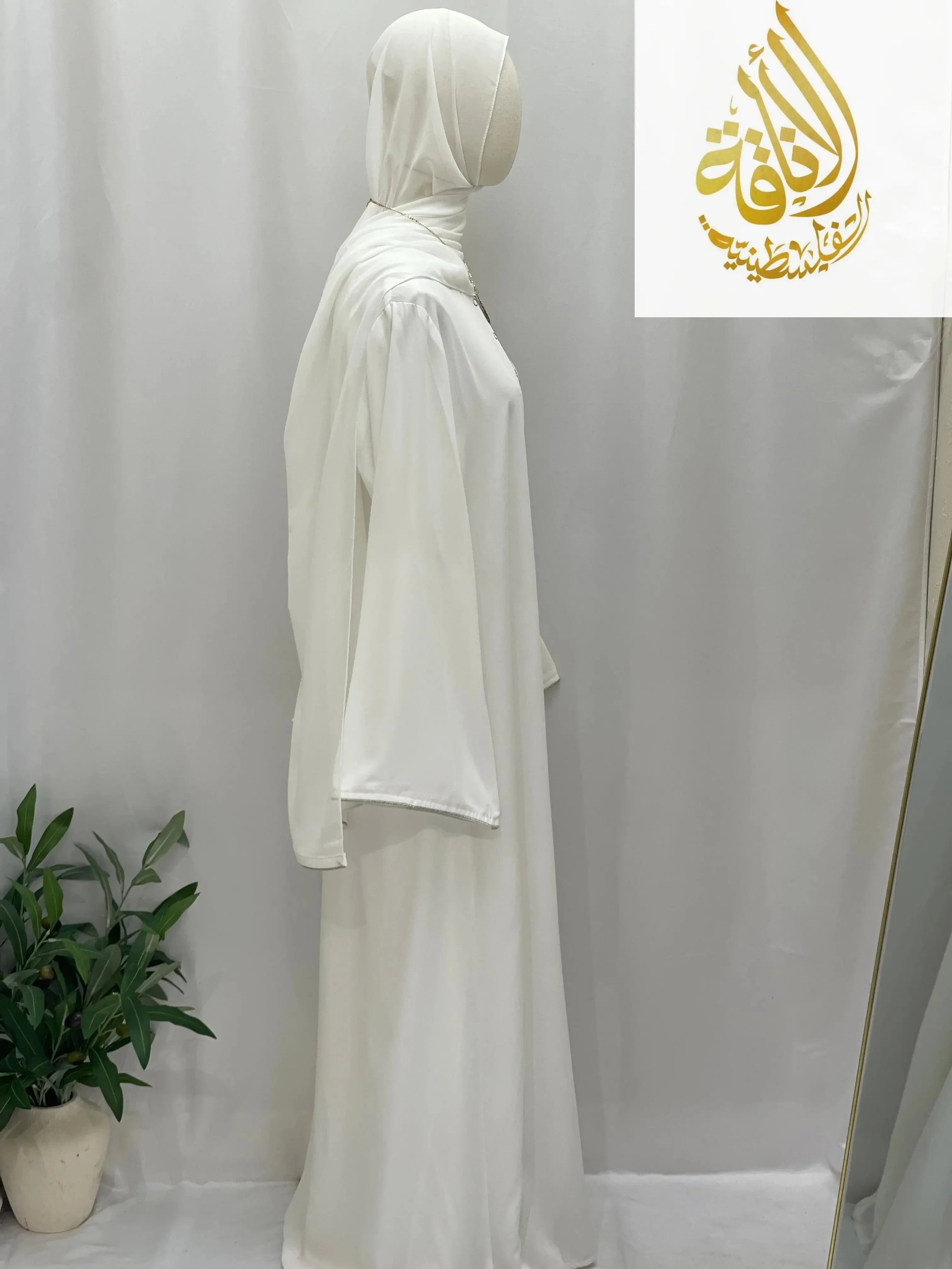 Palestinian Elegance modest umra abaya with hijab in white full-length side view