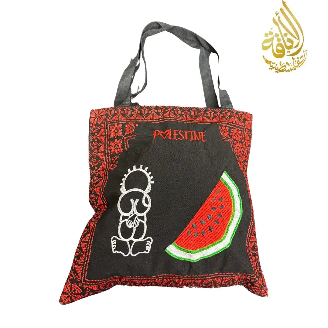 Palestinian embroidered tote bag with black fabric, red traditional patterns, and watermelon design