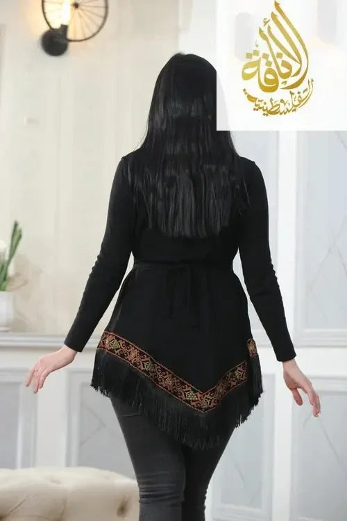 Elegant chiffon vest featuring traditional embroidered patterns.