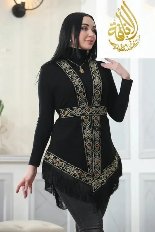 Soft and flowing chiffon vest with detailed floral embroidery.