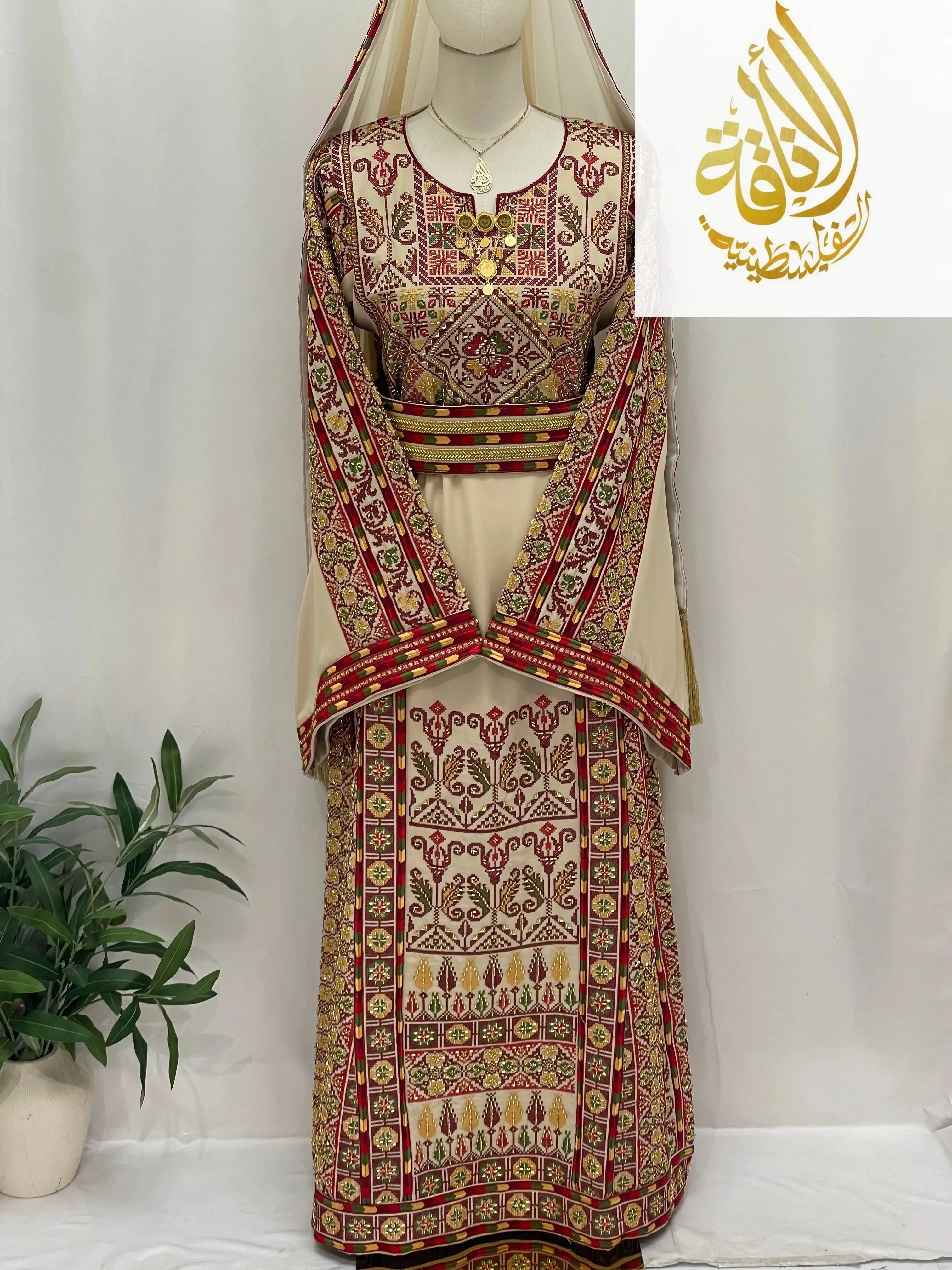 Palestinian Elegance traditional Gold Beads Thoub with intricate red and gold embroidery on beige fabric