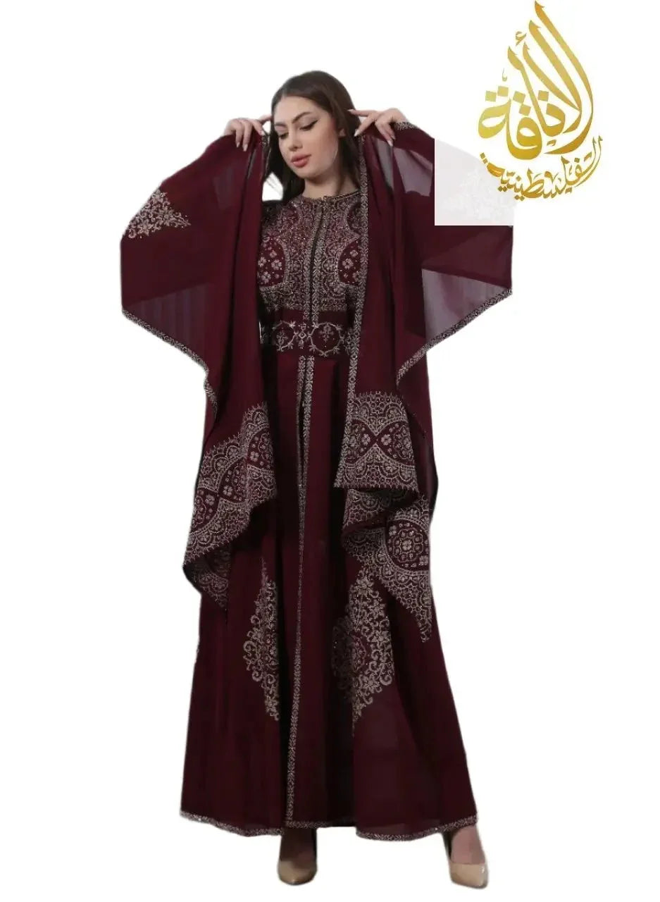Palestinian Elegance embroidered kaftan dress in deep burgundy with intricate traditional patterns