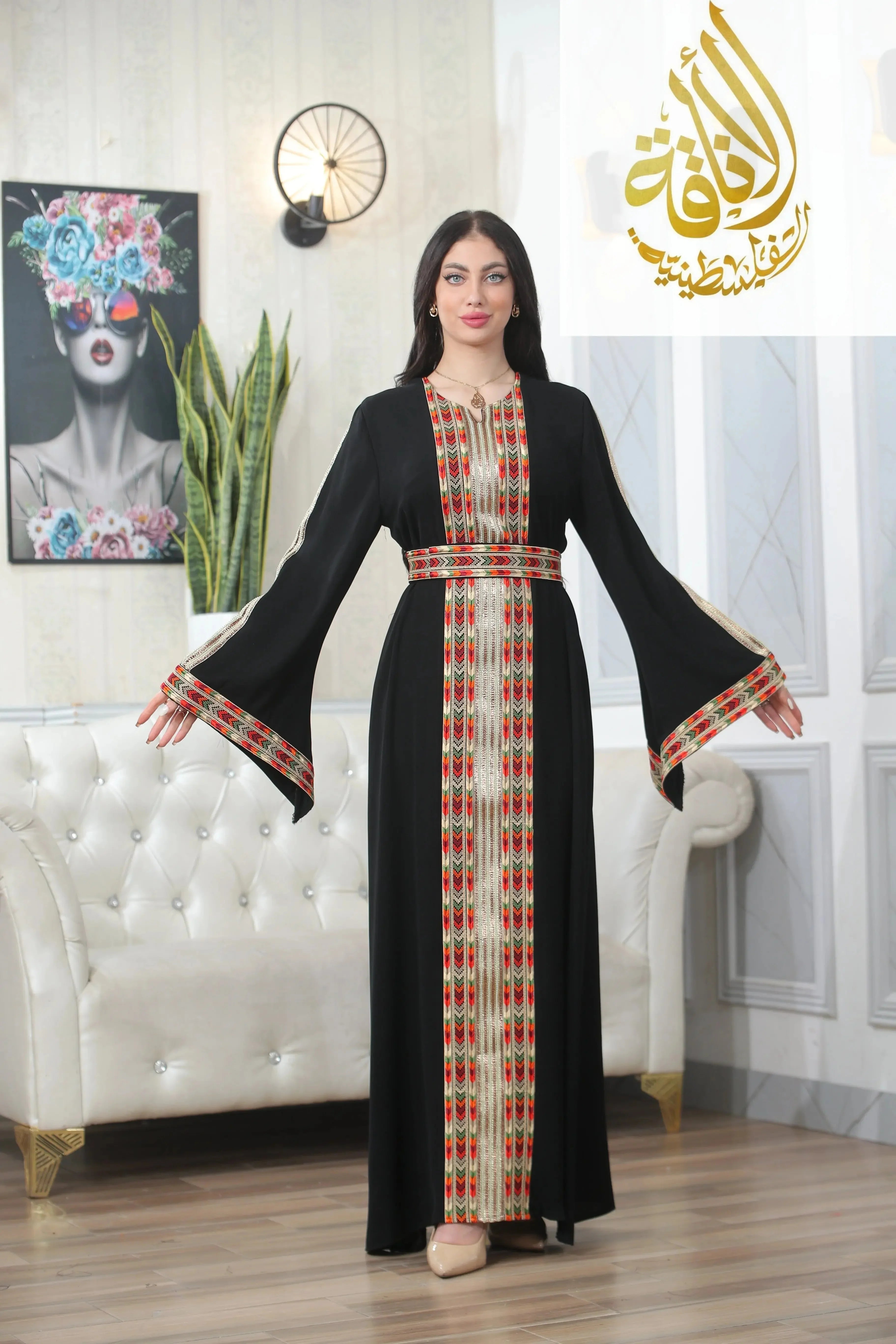 Palestinian Elegance Zena Embroidered Thoub black dress with detailed red and beige embroidery on front and sleeves
