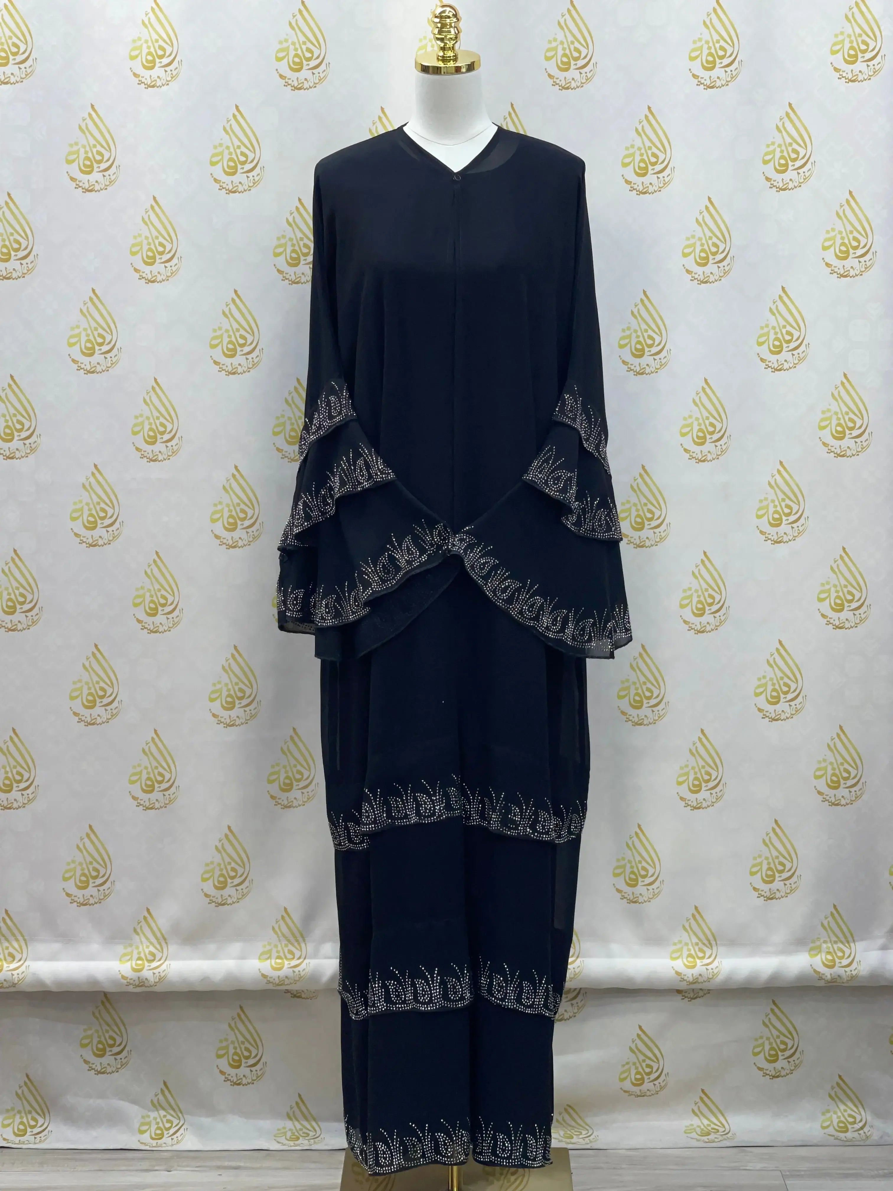 Palestinian Elegance black abaya with strass embellishments and decorative sleeve and hem details