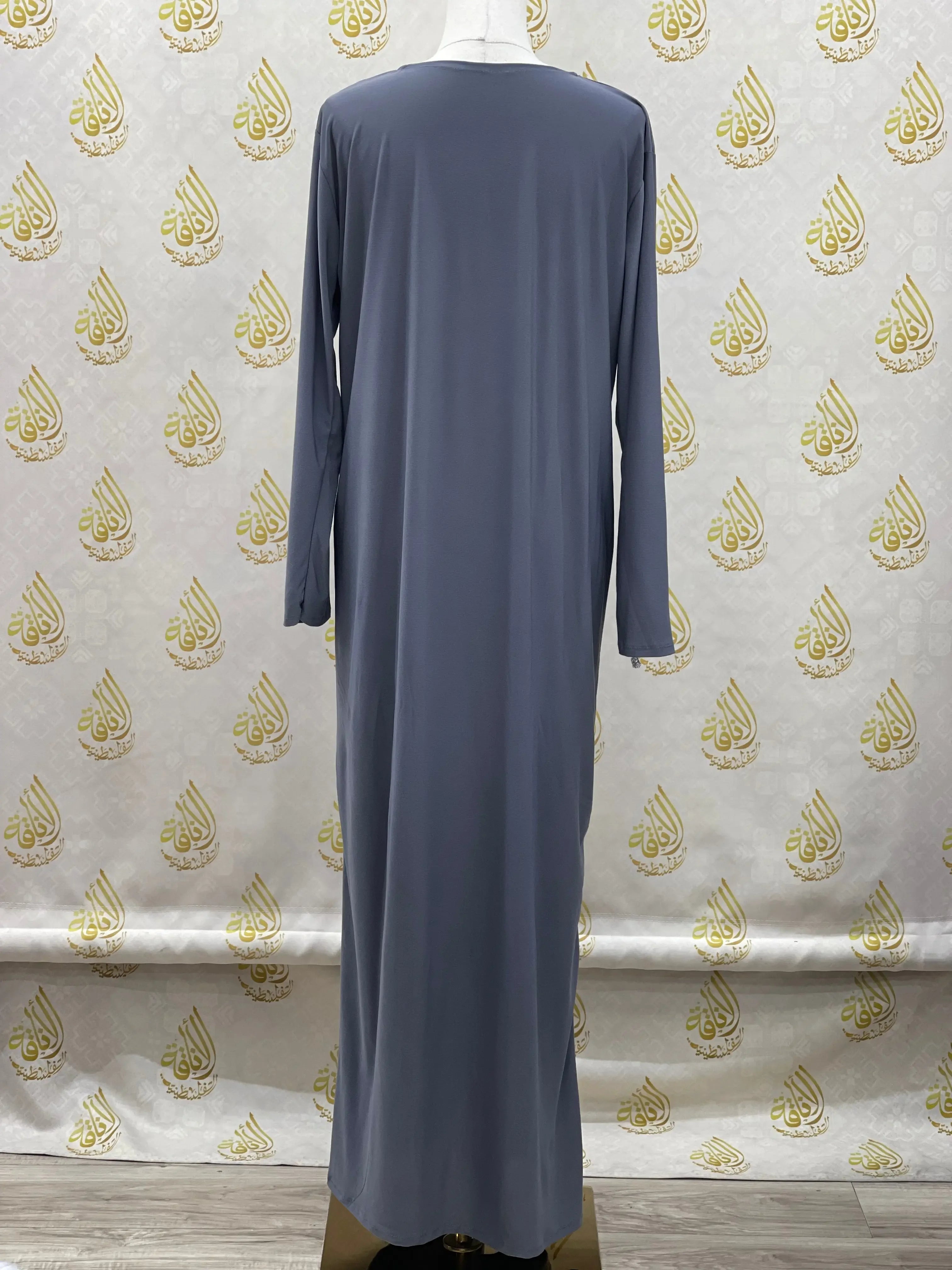 Palestinian Elegance basic solid dress in gray with long sleeves and a modest full-length design