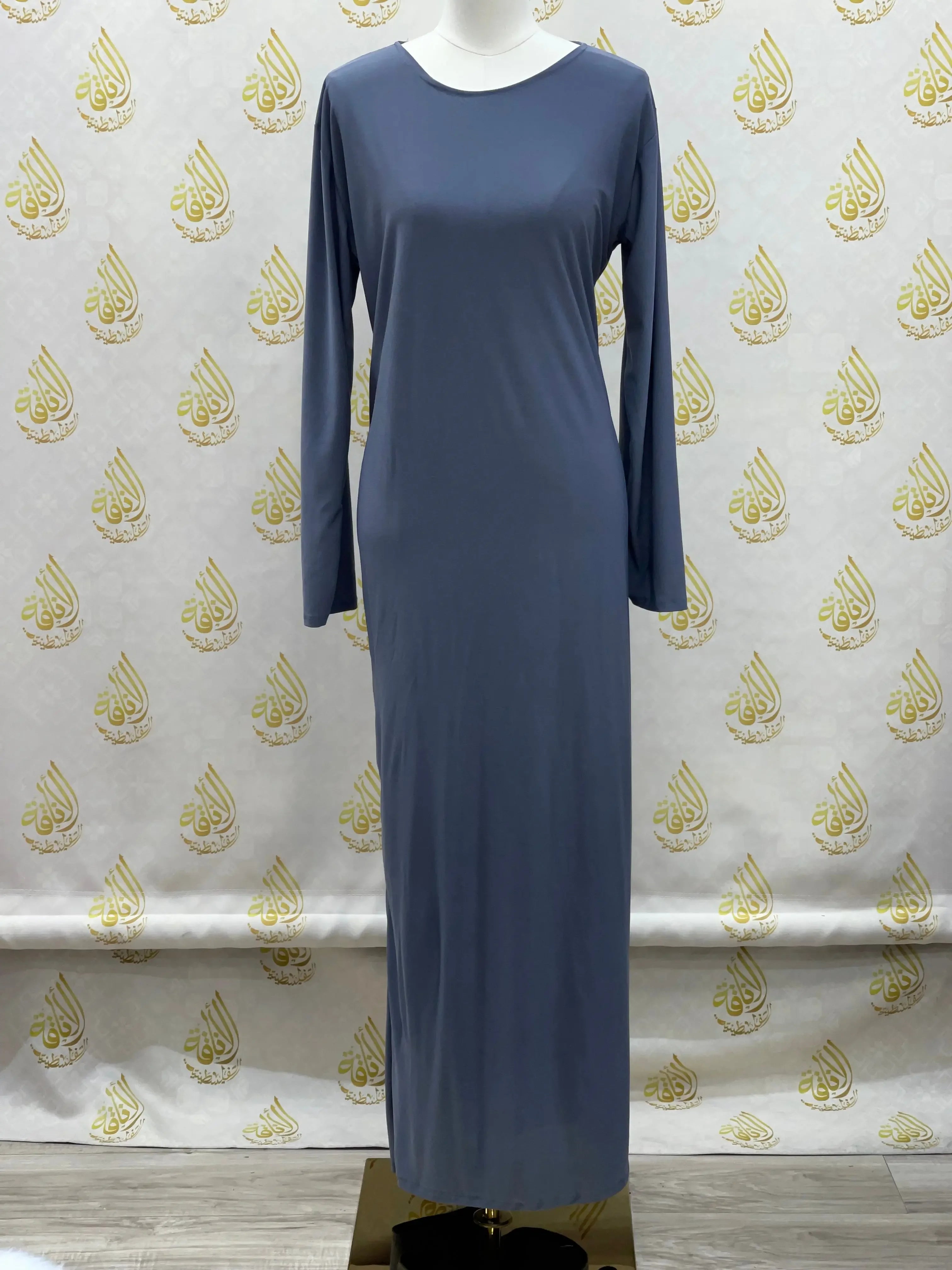 Palestinian Elegance basic solid dress in navy blue with long sleeves and a simple round neckline