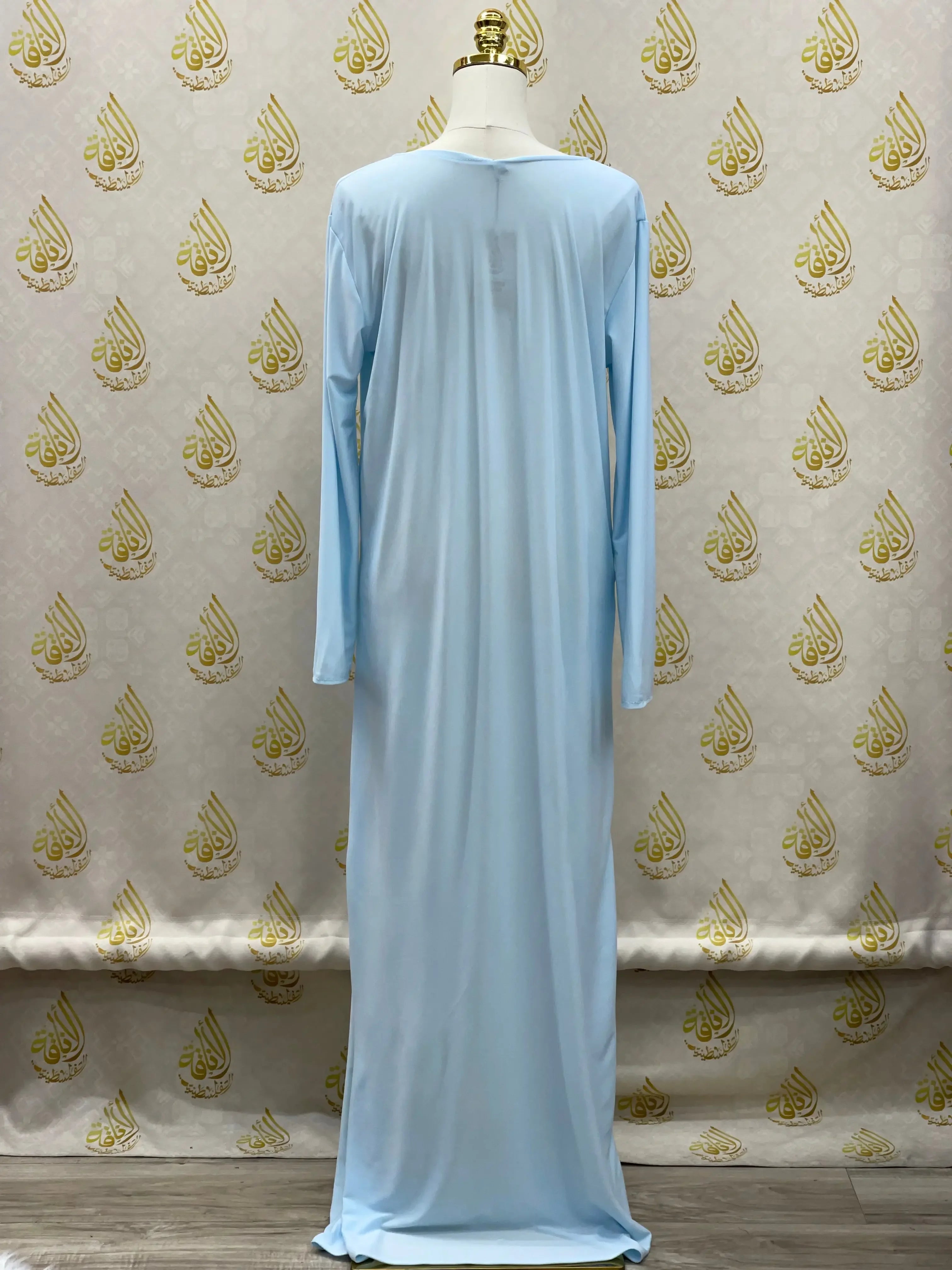 Palestinian Elegance light blue basic solid dress with long sleeves and floor-length design