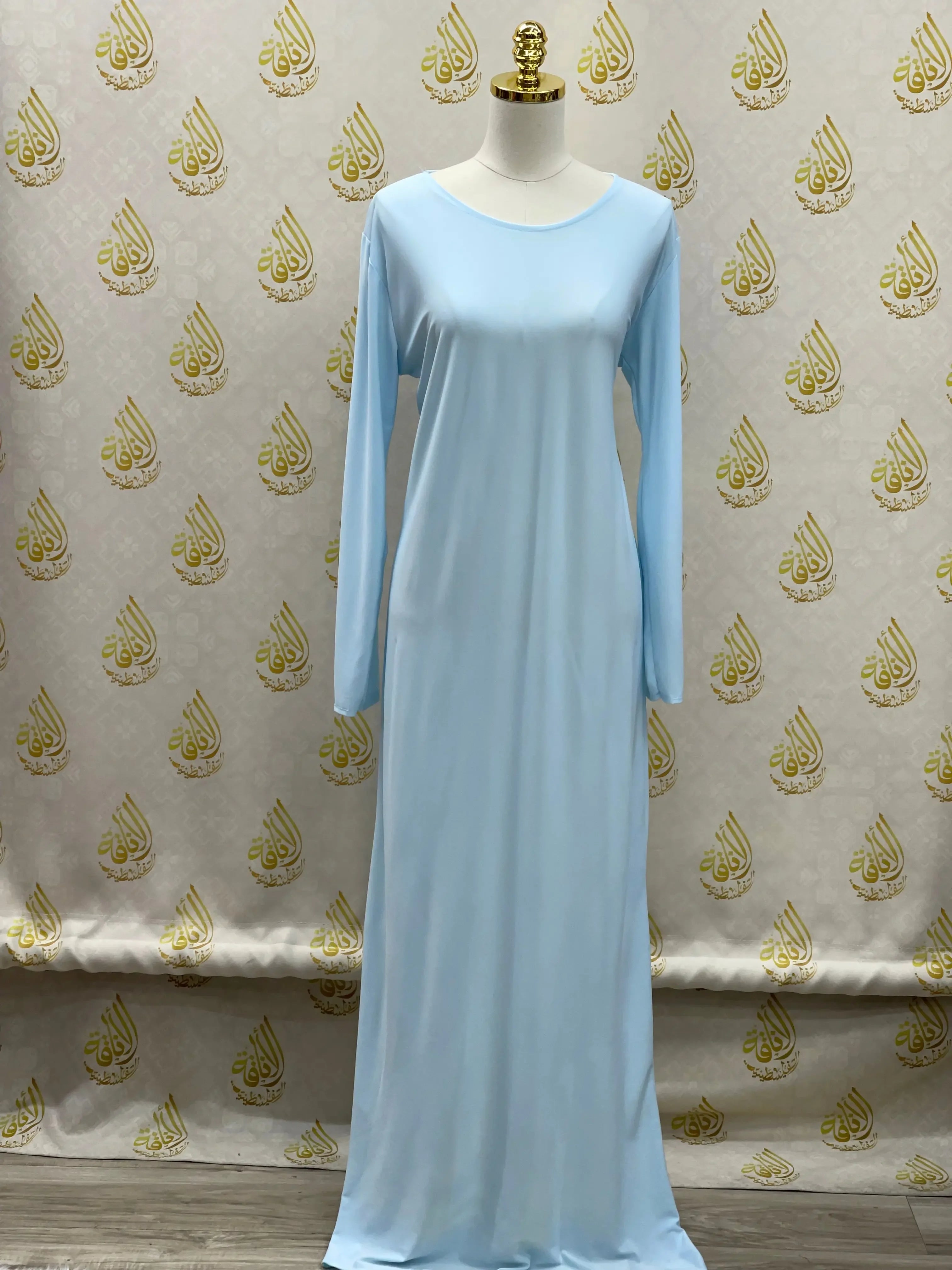 Palestinian elegance basic solid dress in light blue with long sleeves and simple design