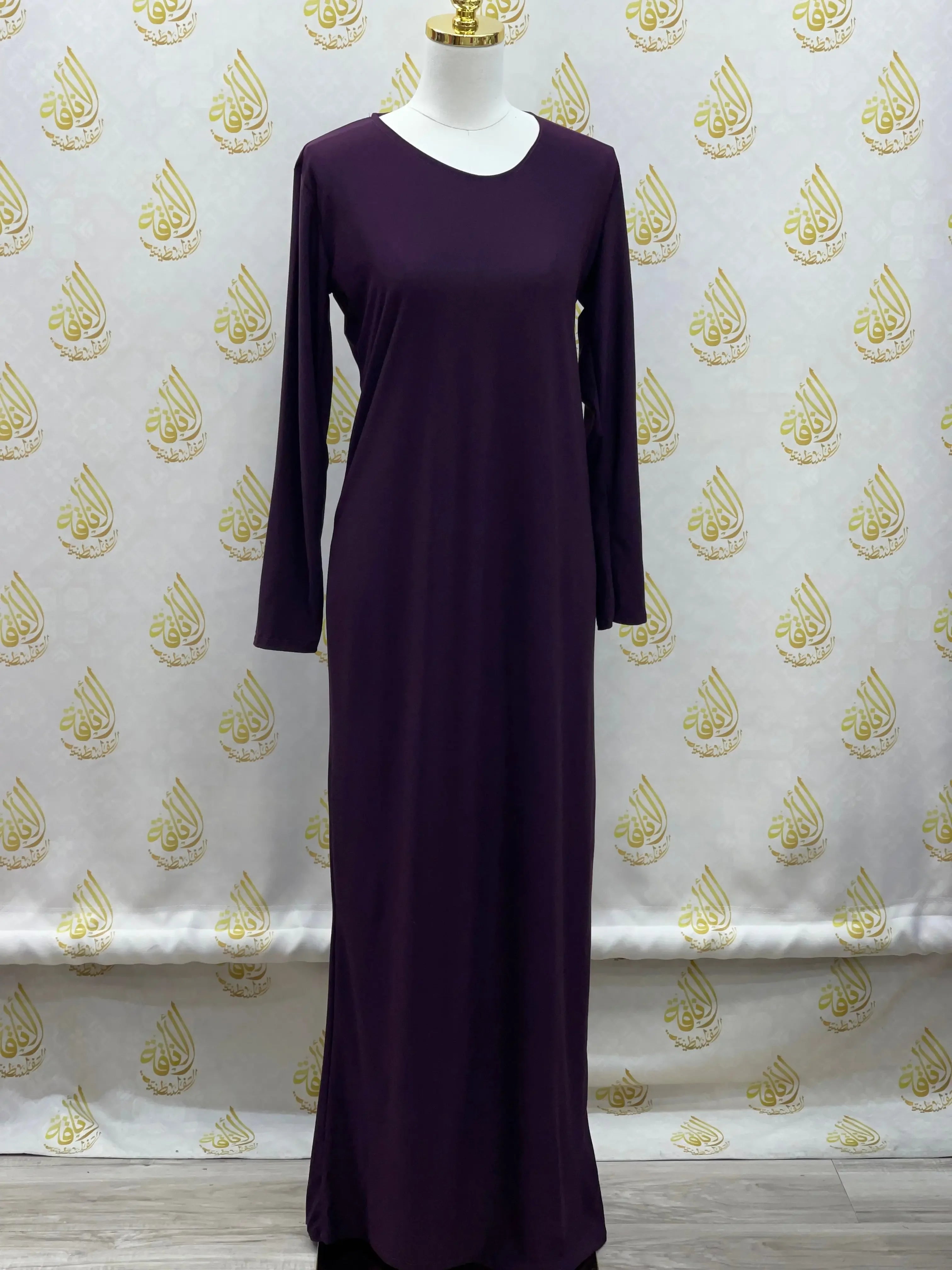 Palestinian Elegance long sleeve basic solid dress in deep purple with a simple round neckline