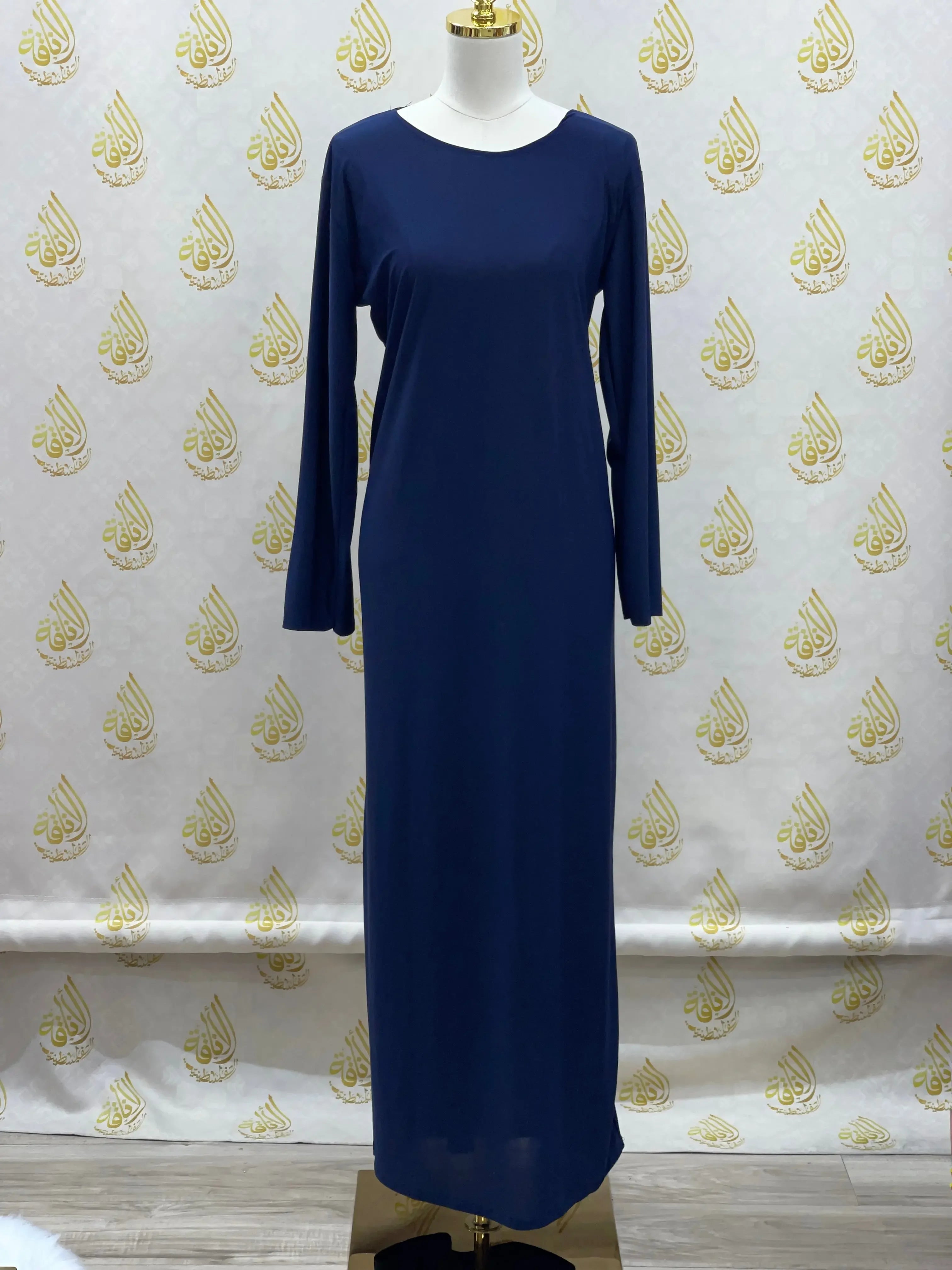 Palestinian Elegance basic solid dress in navy blue with long sleeves and a round neckline