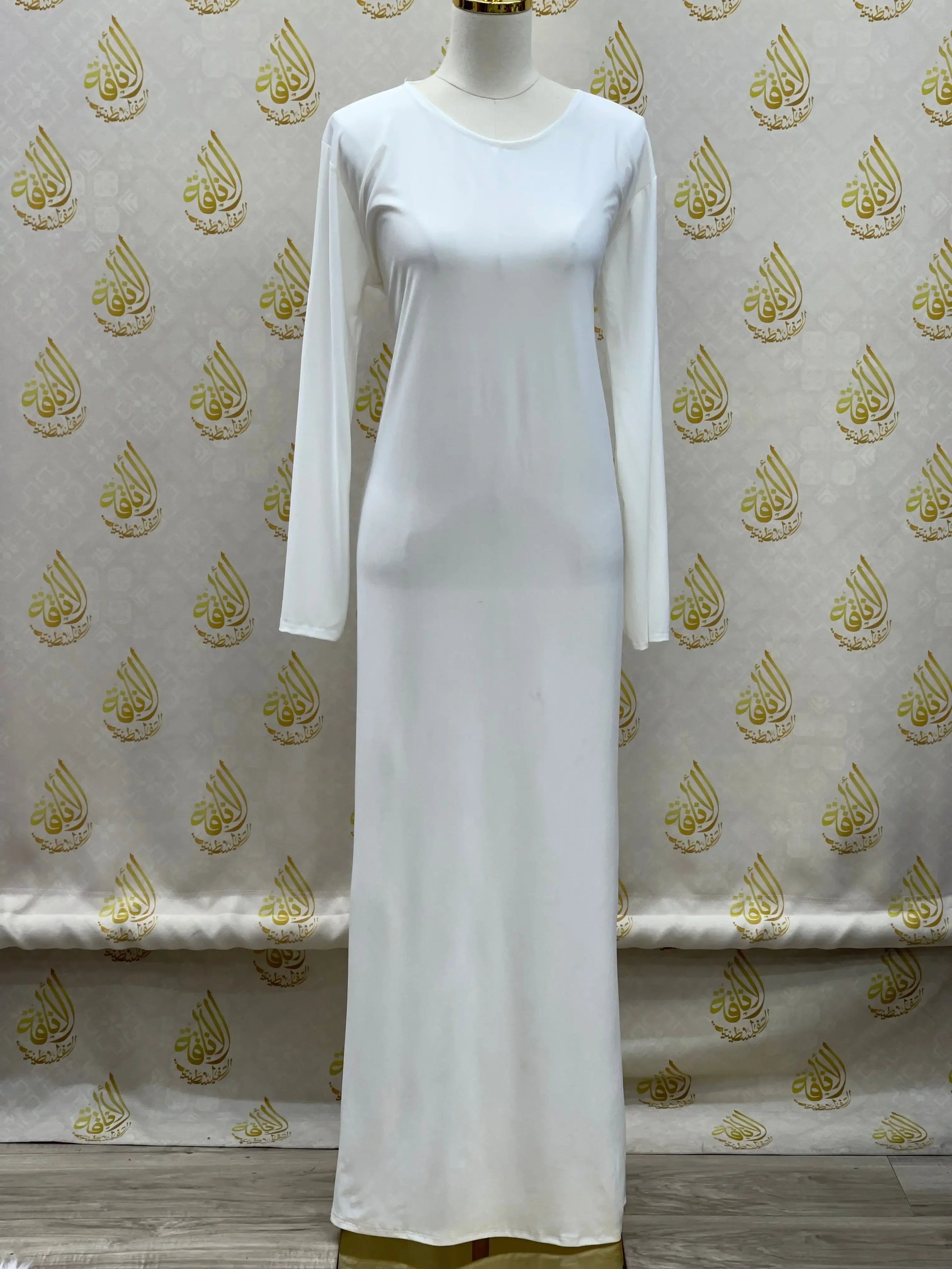Palestinian Elegance white long sleeve basic solid dress with a simple round neckline
