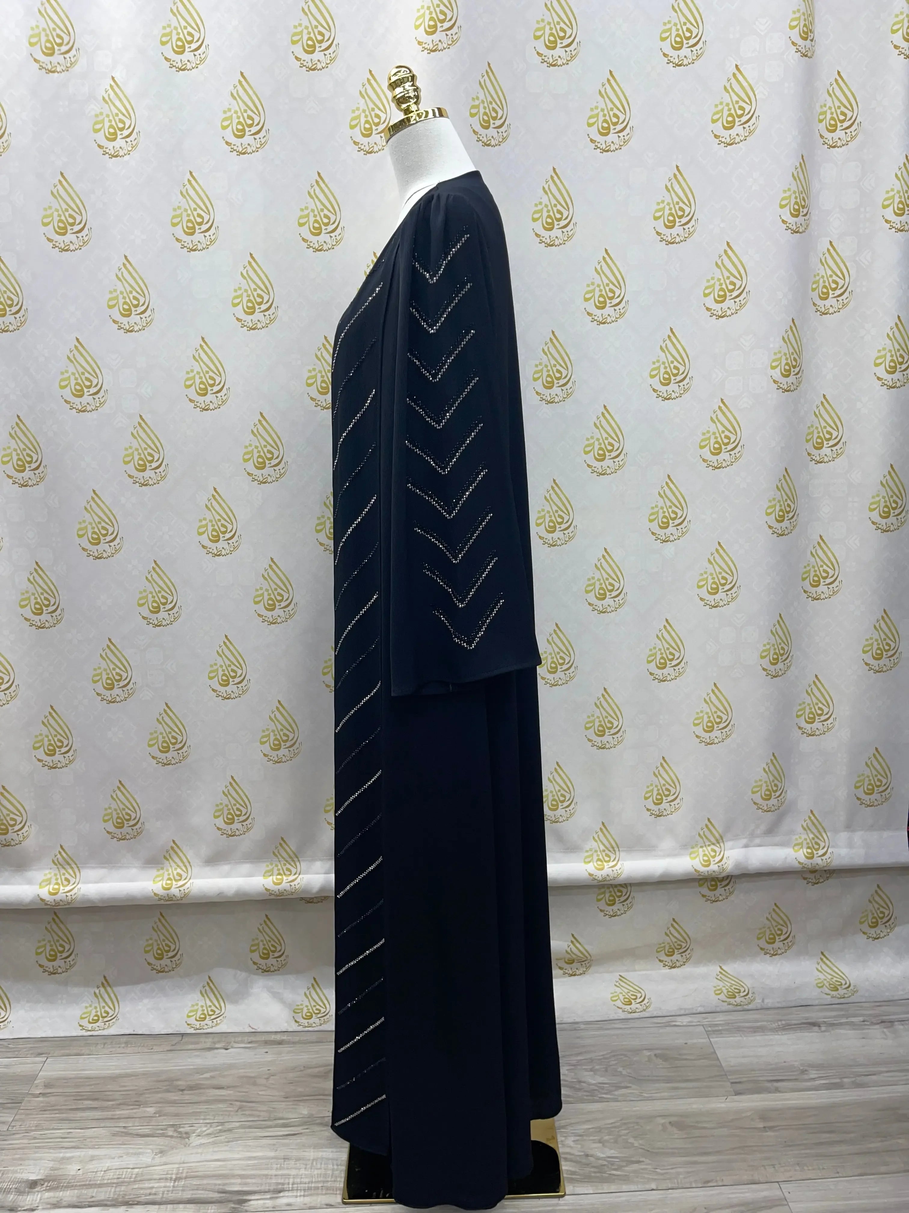 Black Abaya with Strass by Palestinian Elegance featuring elegant strass detailing on sleeves and front