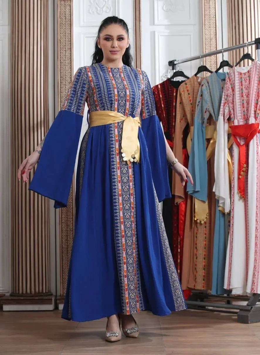 Palestinian Elegance embroidered Manjel dress in blue with intricate traditional embroidery and wide sleeves