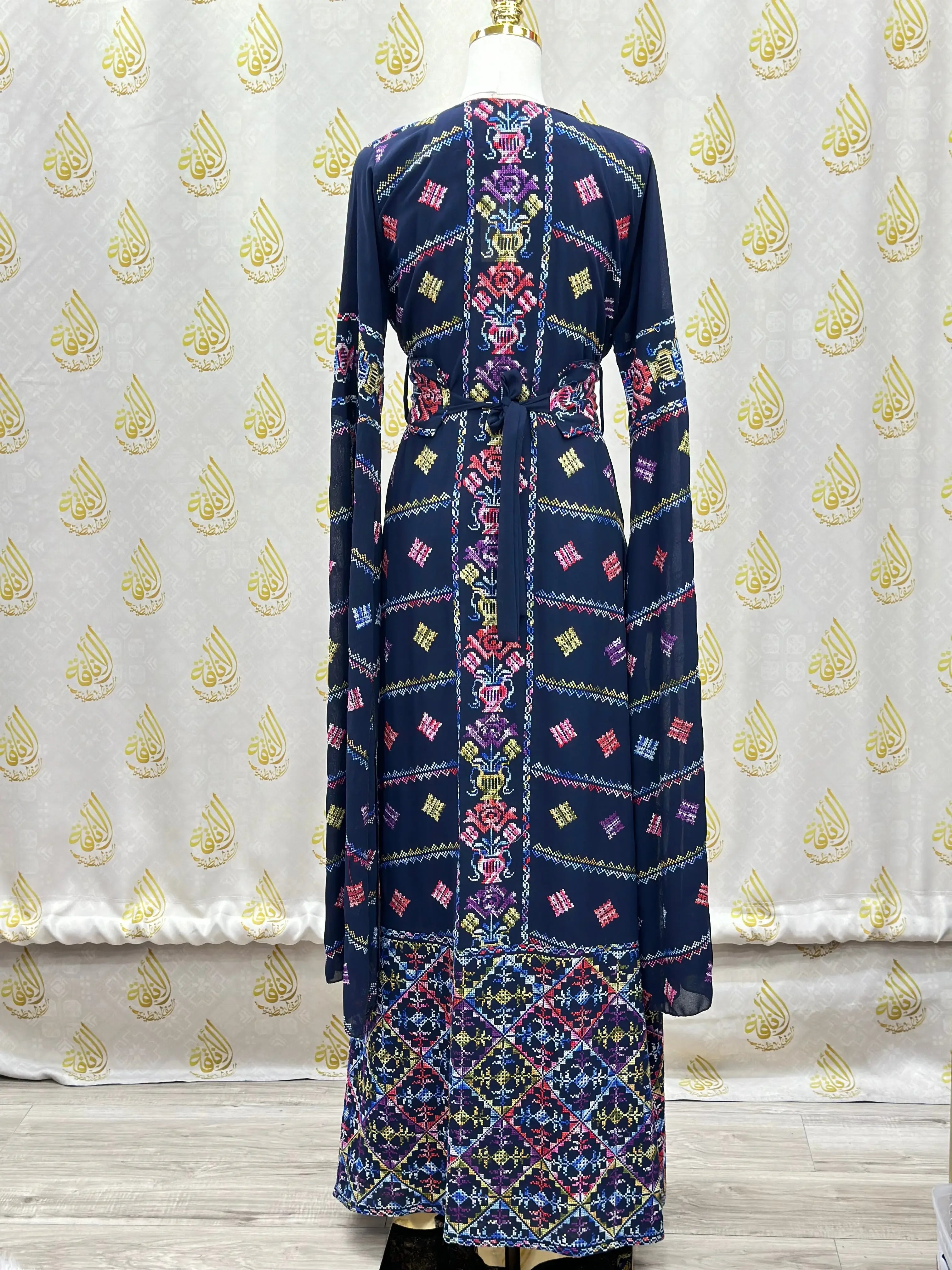 Palestinian Elegance luxury embroidered abaya kaftan with intricate colorful embroidery and long sleeves