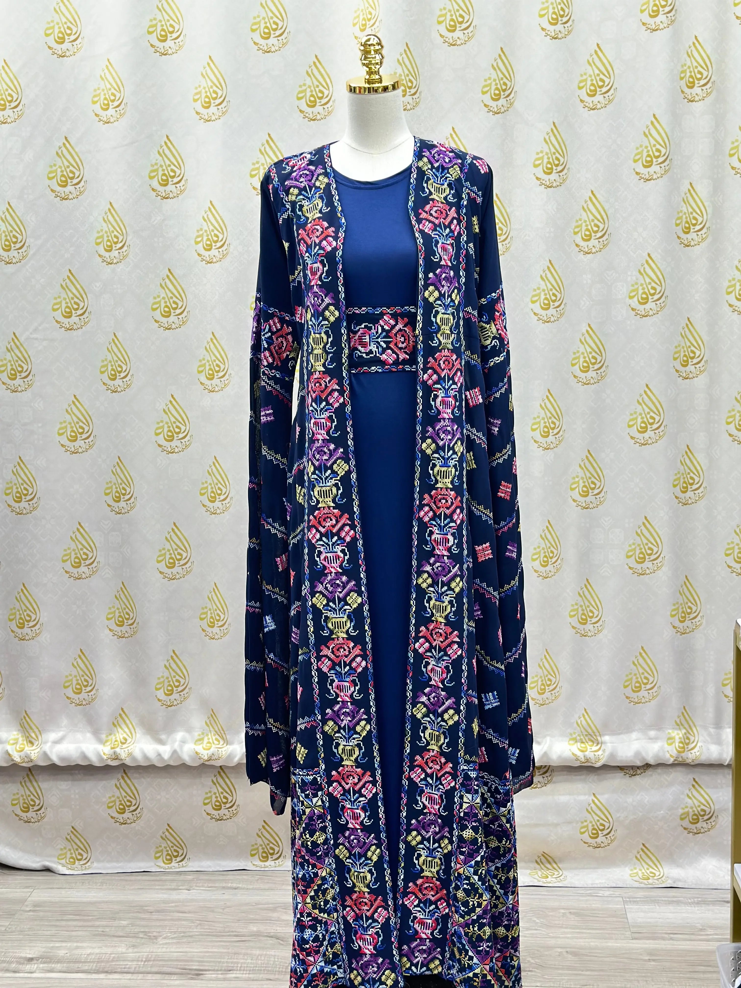 Palestinian Elegance luxury embroidered abaya in navy blue with colorful floral embroidery and long open front kaftan style