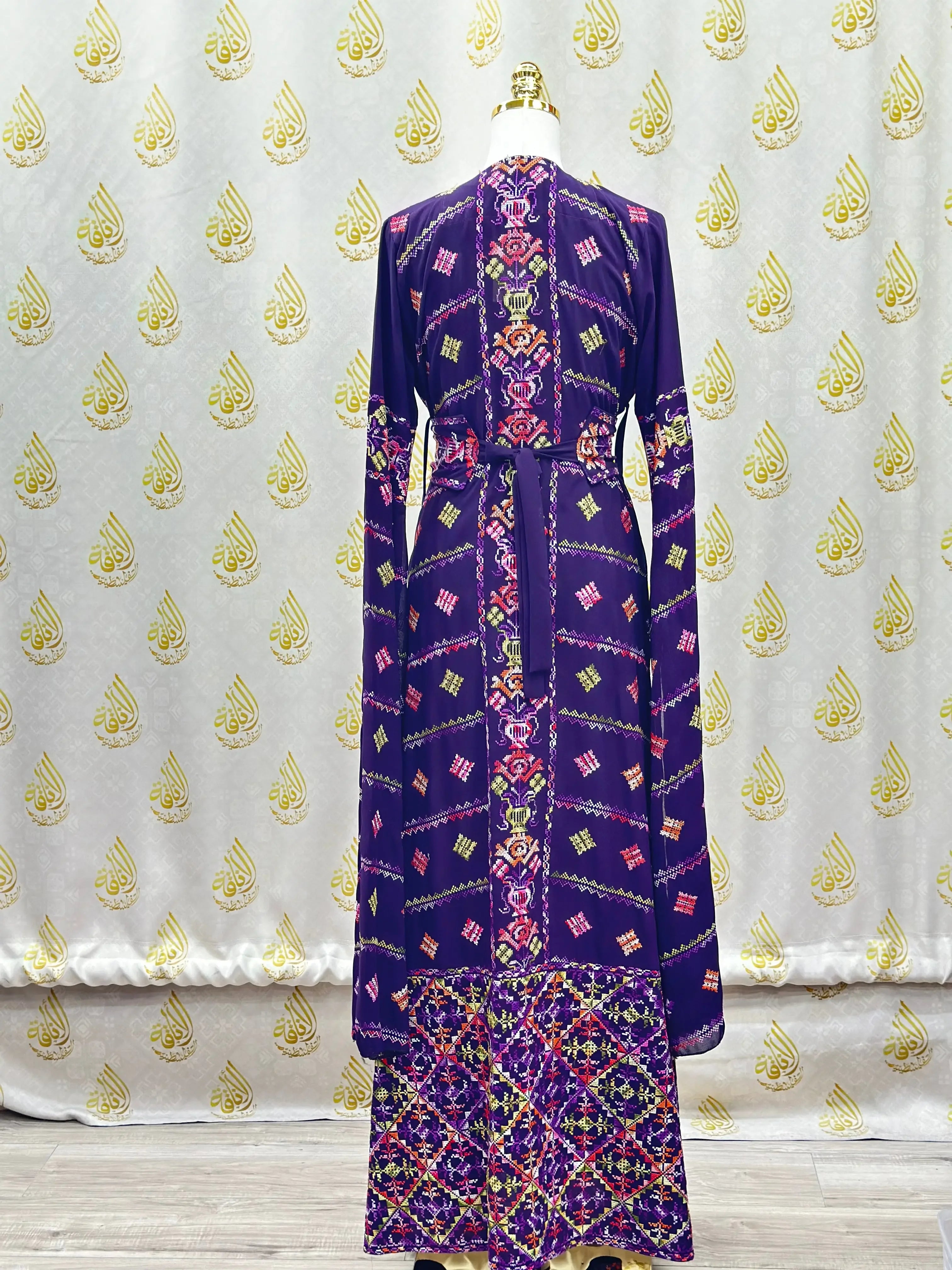 Palestinian Elegance luxury embroidered abaya kaftan in deep purple with colorful traditional embroidery