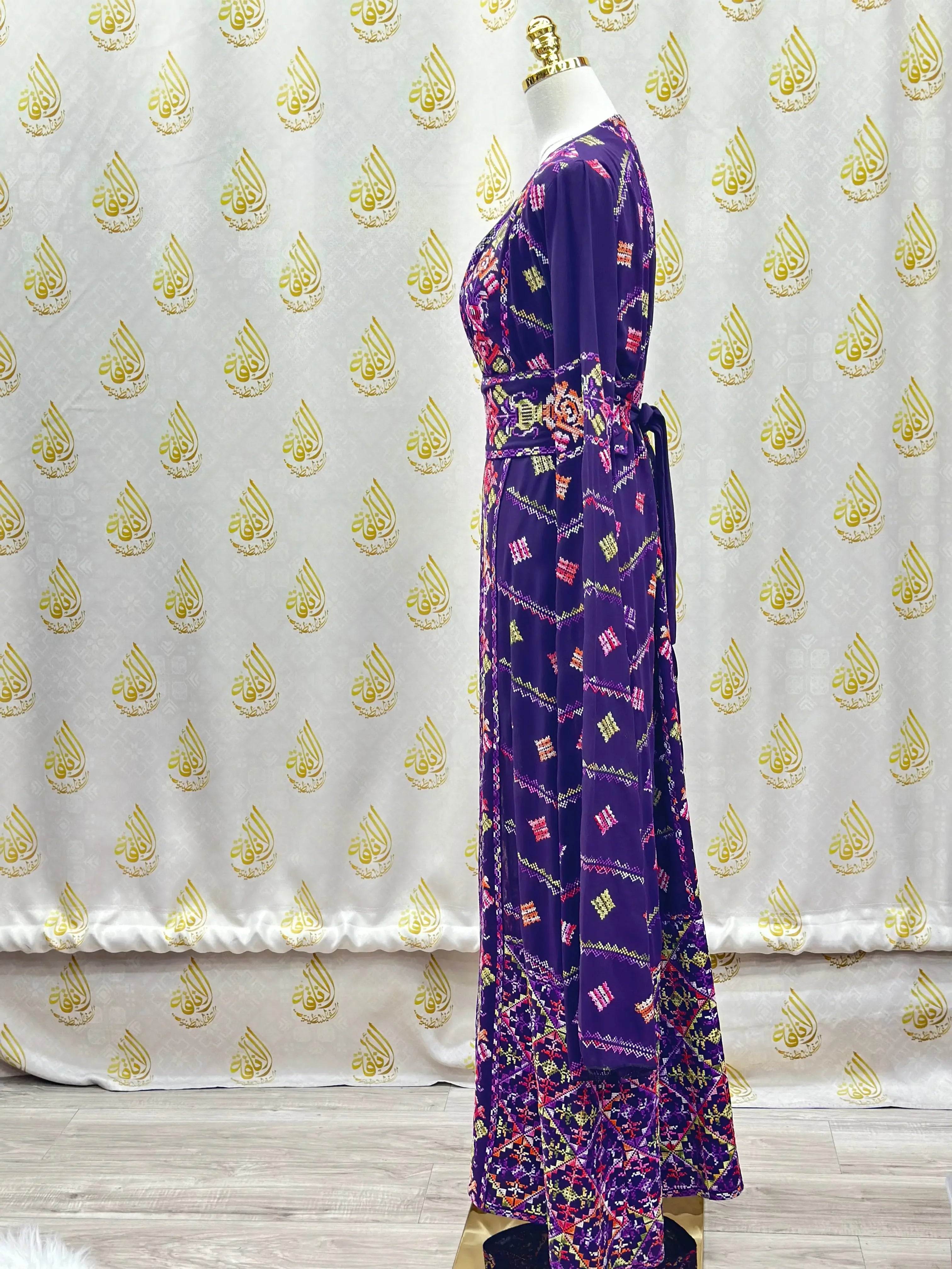 Purple Kaftan by Palestinian Elegance featuring intricate patterns as a luxury embroidered abaya