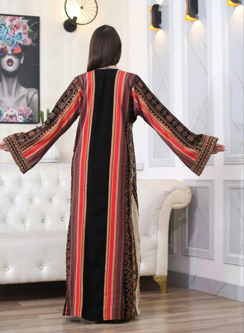 Back view of Brown Majdalwi Embroidered Dress with intricate patterns and stripes by Palestinian Elegance