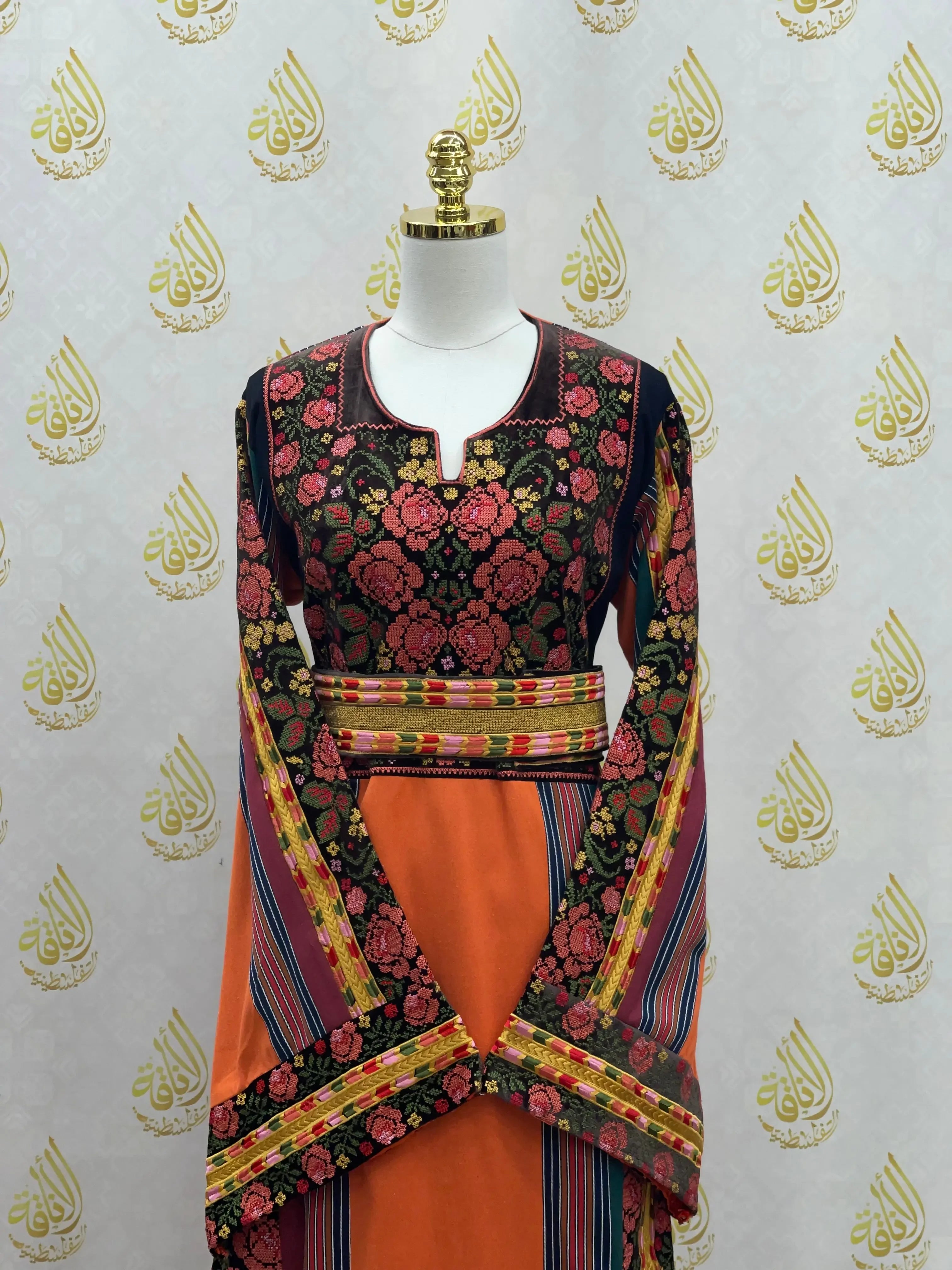 Brown Velvet Orange Majdlawi Thoub embroidery dress by Palestinian Elegance with intricate floral and striped designs
