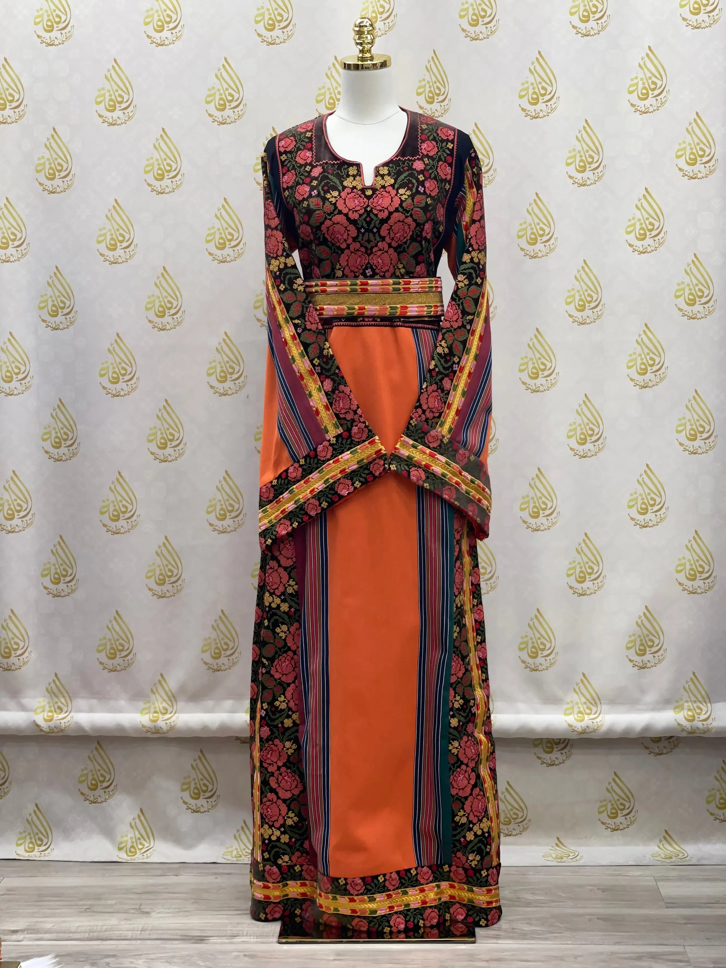 Brown Velvet Orange Majdlawi Thoub with intricate floral embroidery and traditional Palestinian design