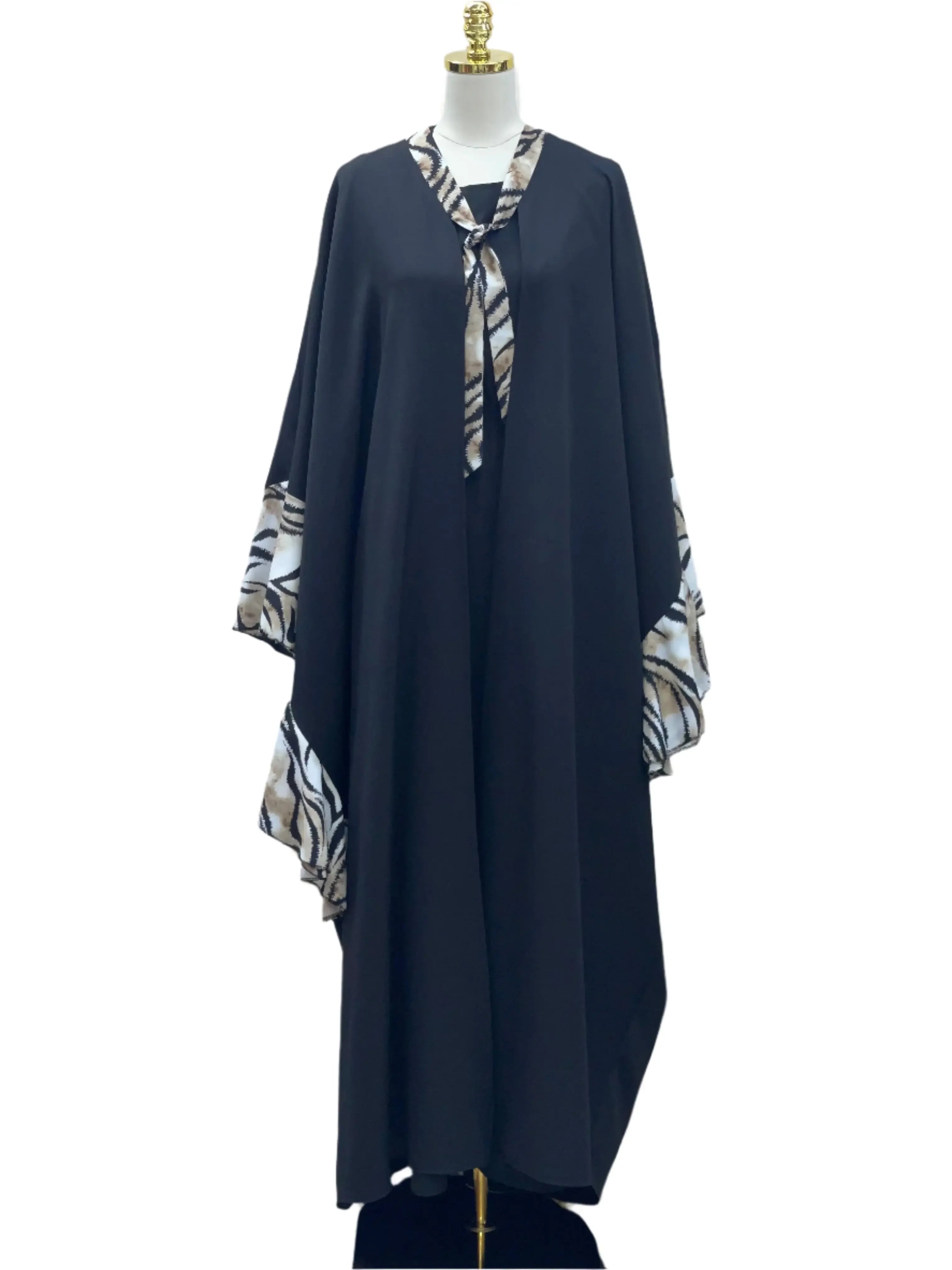 Palestinian Elegance black butterfly abaya dress with patterned collar and sleeve accents