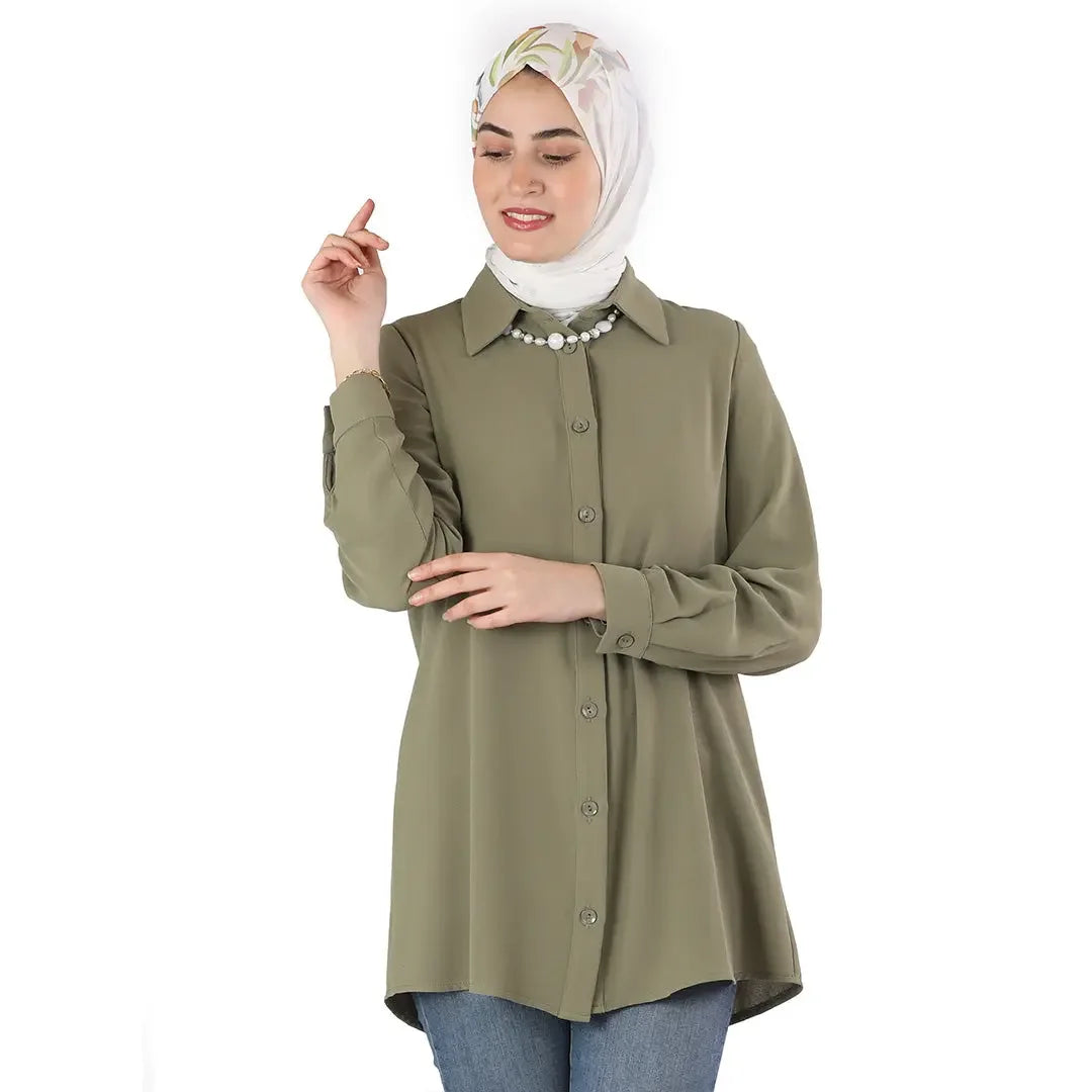 Palestinian Elegance olive green classic button up shirt worn with hijab and blue jeans