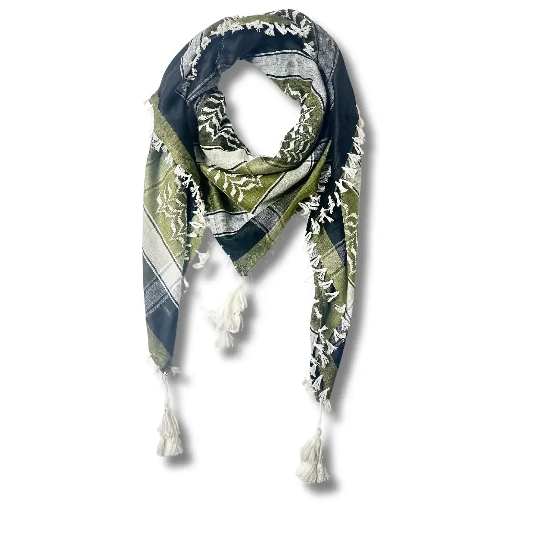 Colorful kuffiyeh scarf with green, black, and white patterns and tassels by Palestinian Elegance