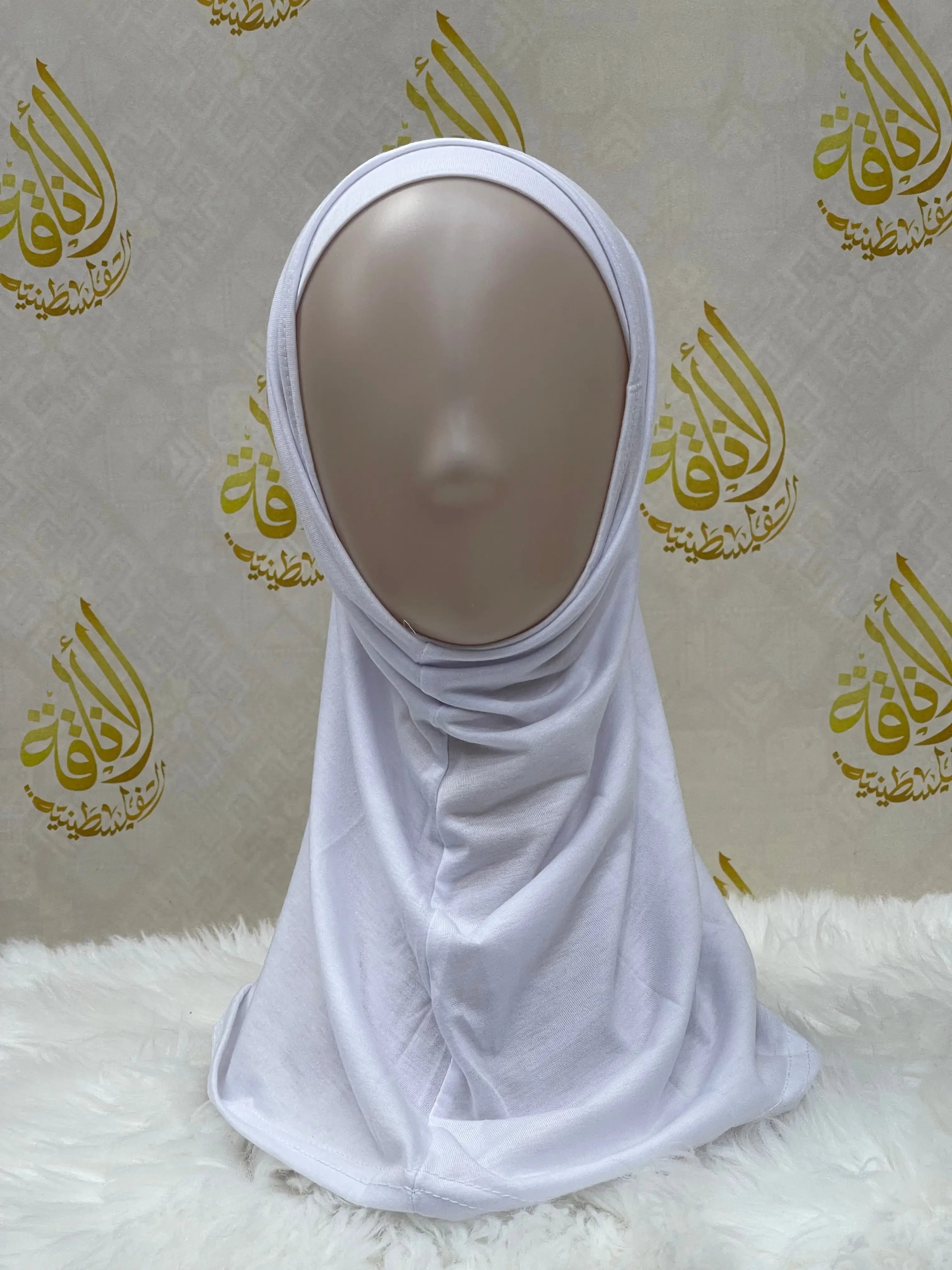 Palestinian Elegance white cotton hijab for women displayed on a mannequin with a soft fabric texture