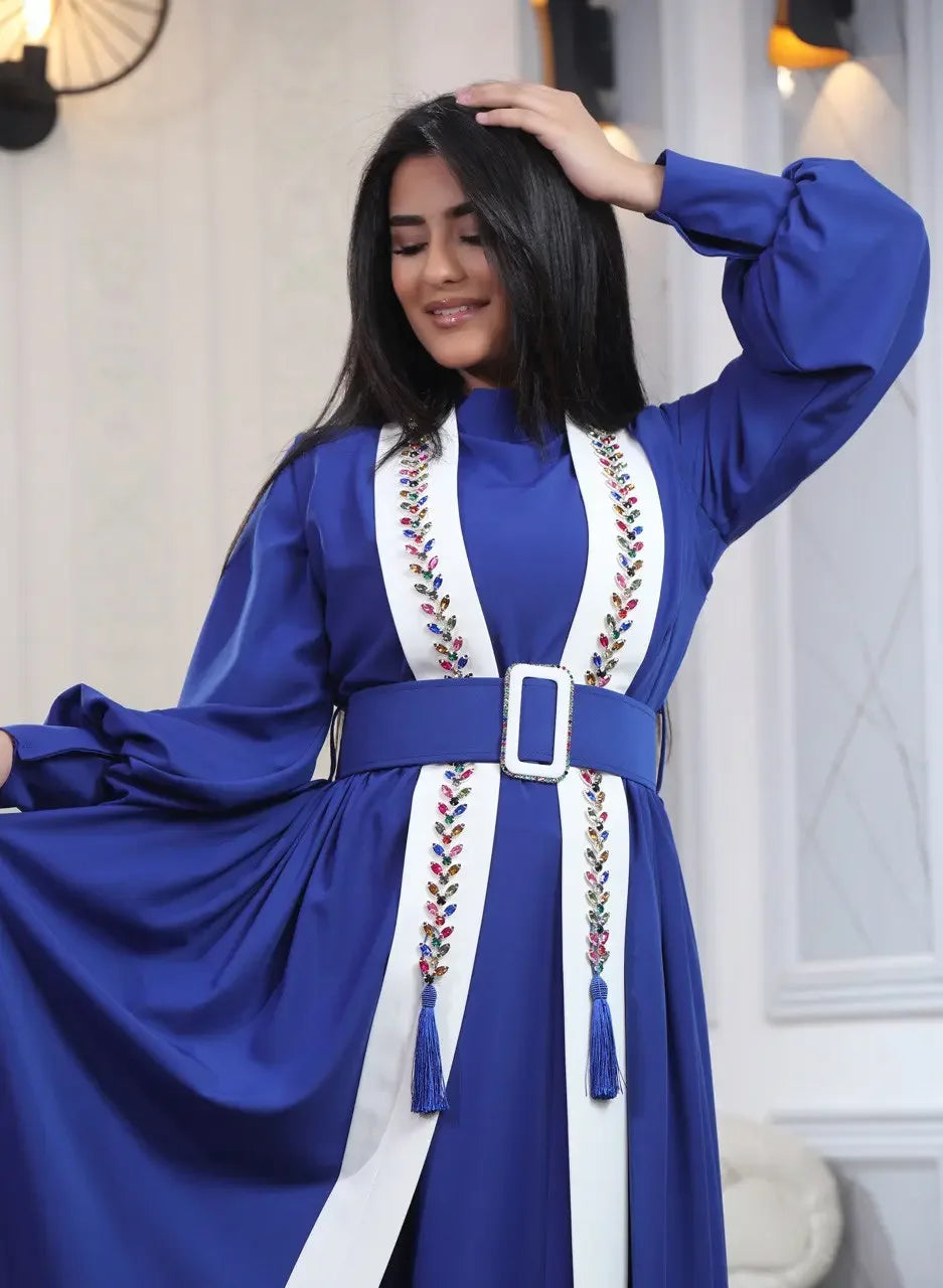 Palestinian Elegance blue crystal kaftan dress with embroidered details and wide belt