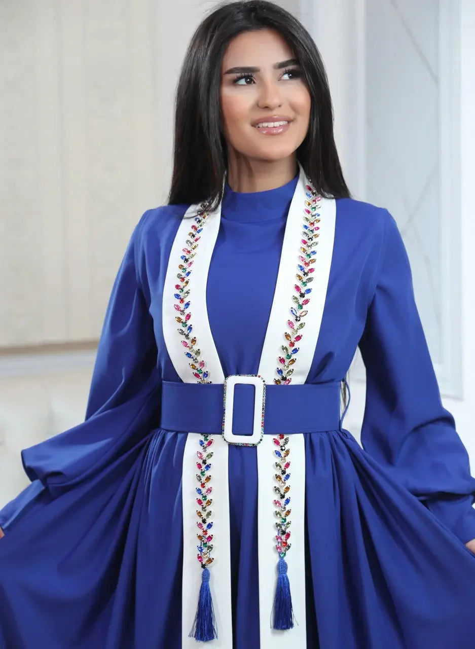 Palestinian Elegance blue crystal kaftan dress with white embroidered trim and matching belt