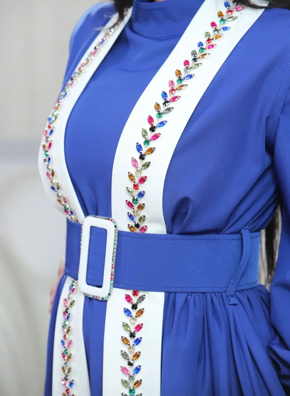 Palestinian Elegance blue crystal kaftan dress with colorful gemstone embellishments and matching belt