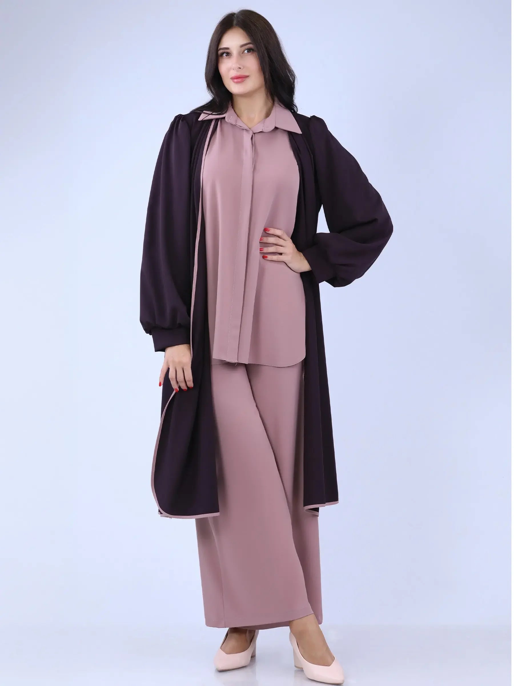 Palestinian Elegance long black cardigan with balloon sleeves worn over mauve outfit