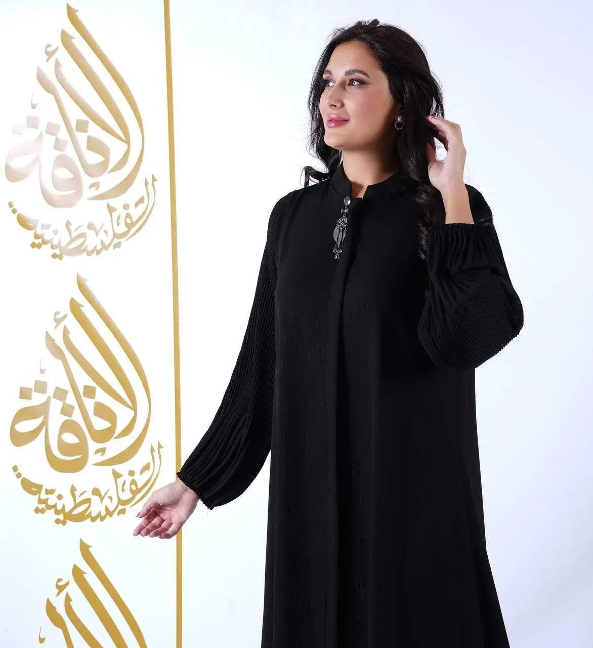 Palestinian Elegance black abaya with elastic sleeve abaya for women featuring pleated sleeve design