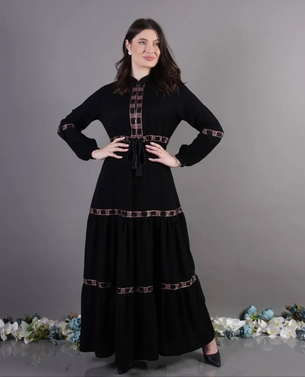 Palestinian Elegance black elegant abaya dress with patterned trim and self-tie waist belt