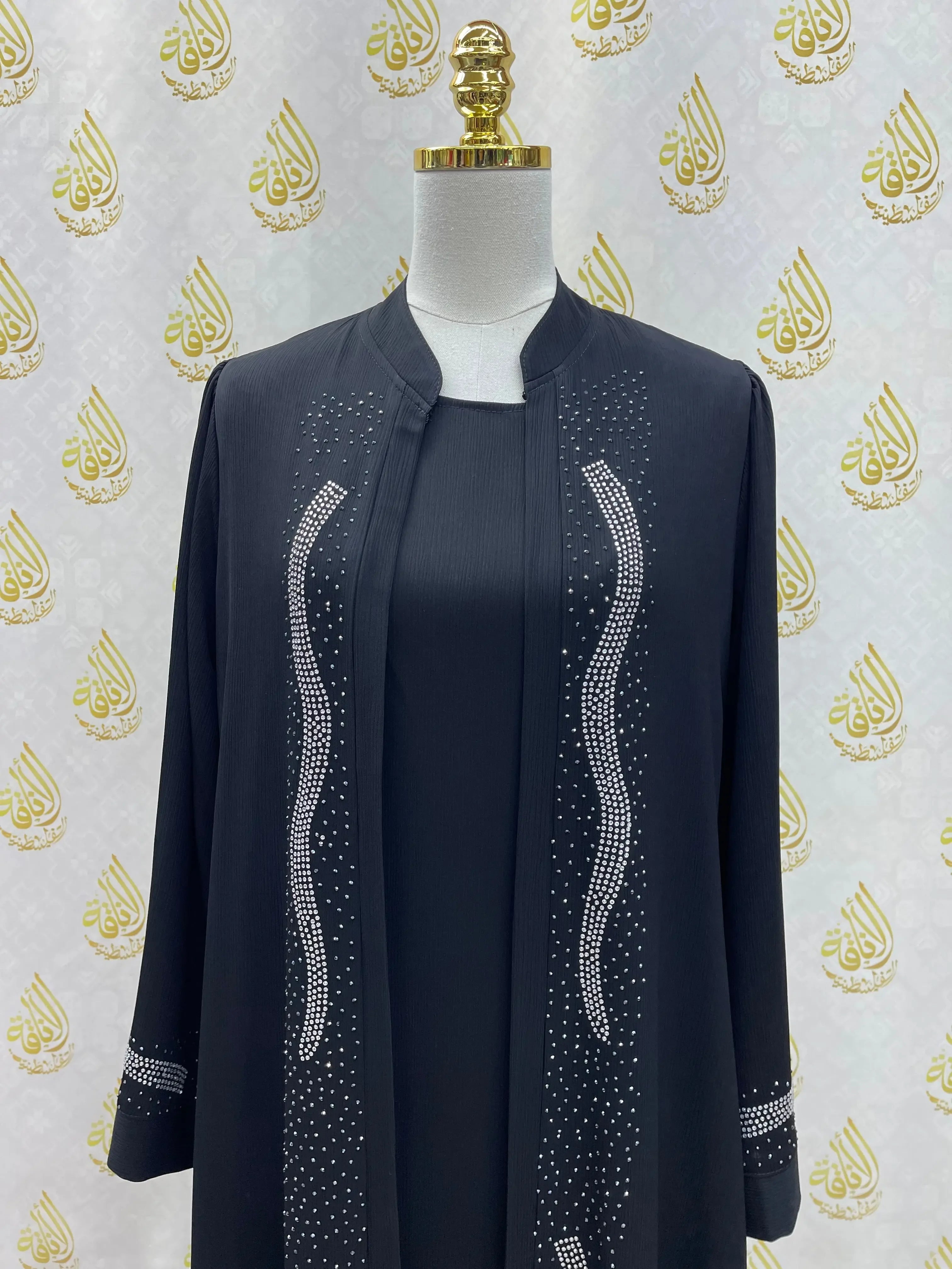 Palestinian Elegance black elegant abaya with strass detailing on front and sleeves