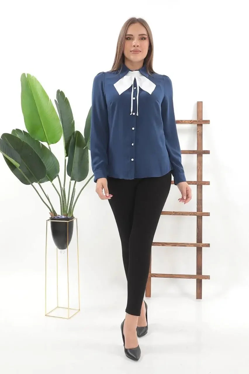 Palestinian Elegance casual navy elegant bow tie blouse paired with black pants and heels