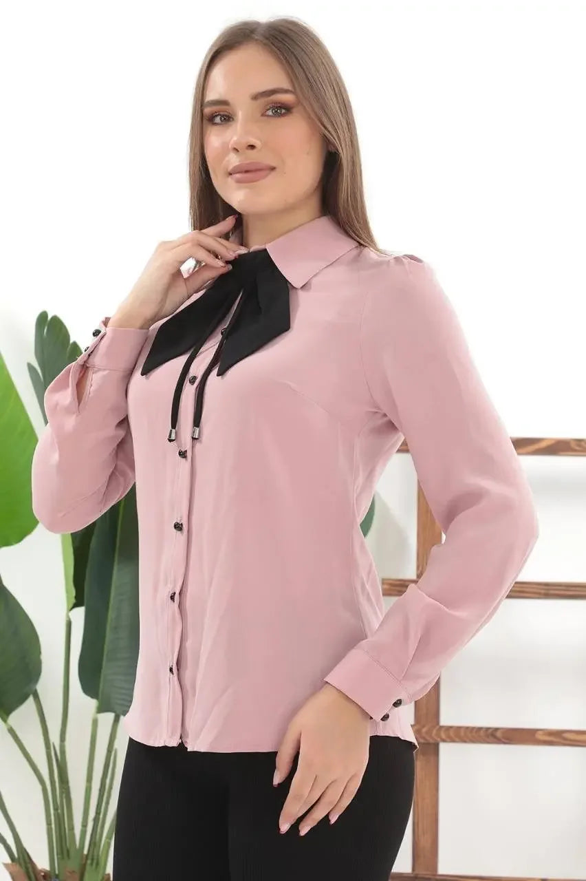 Palestinian Elegance casual elegant bow tie blouse in soft pink with black bow detail