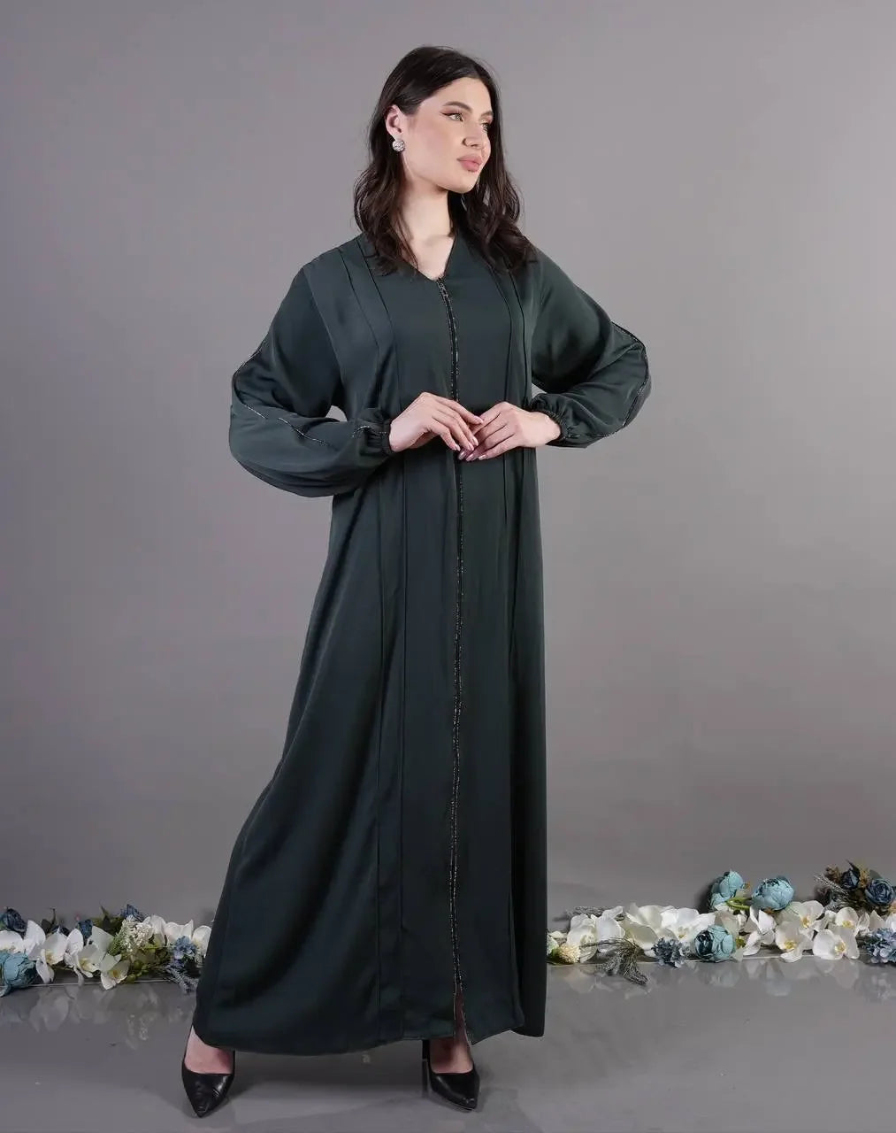 Elegant Palestinian abaya by Palestinian Elegance long black with button detailing and balloon sleeves