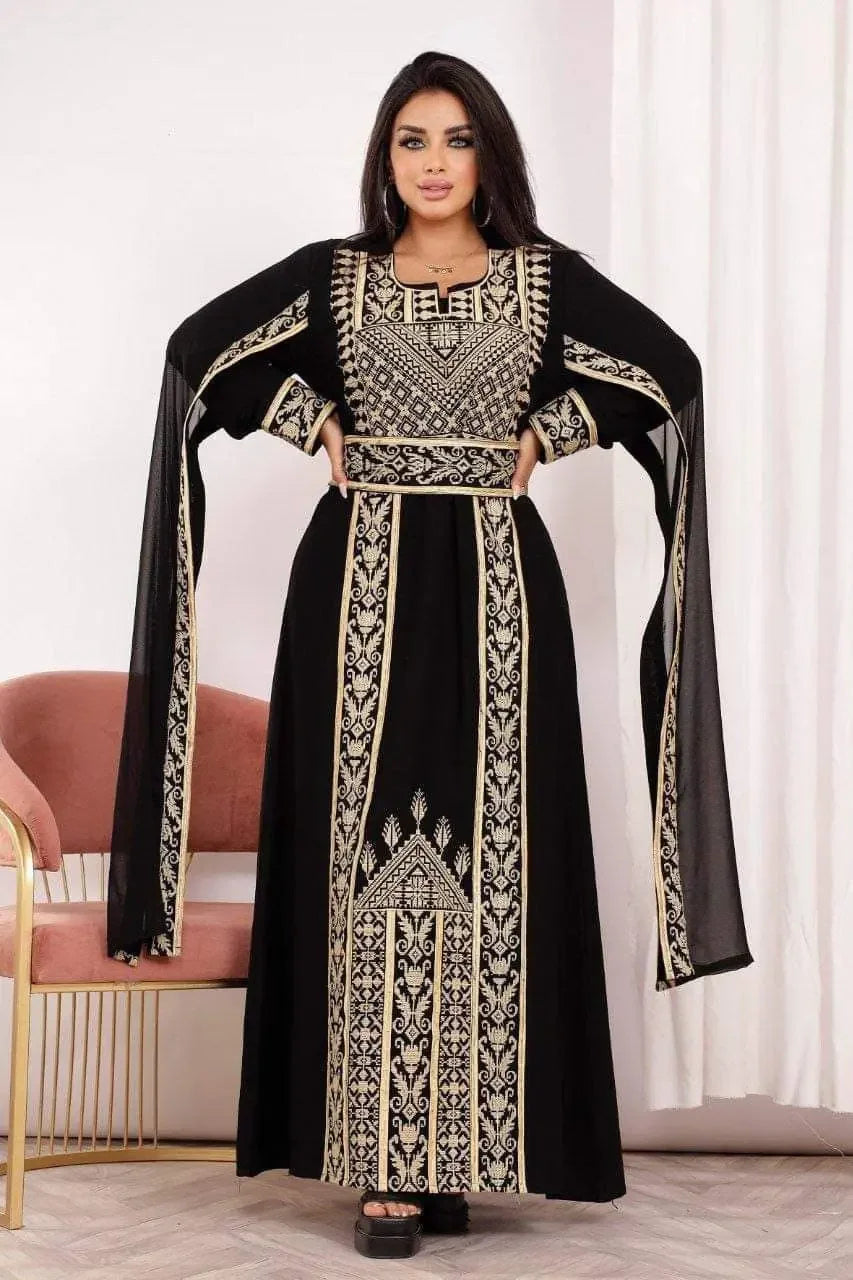 Palestinian Elegance black embroidered abaya dress with gold geometric patterns and flowing sleeves