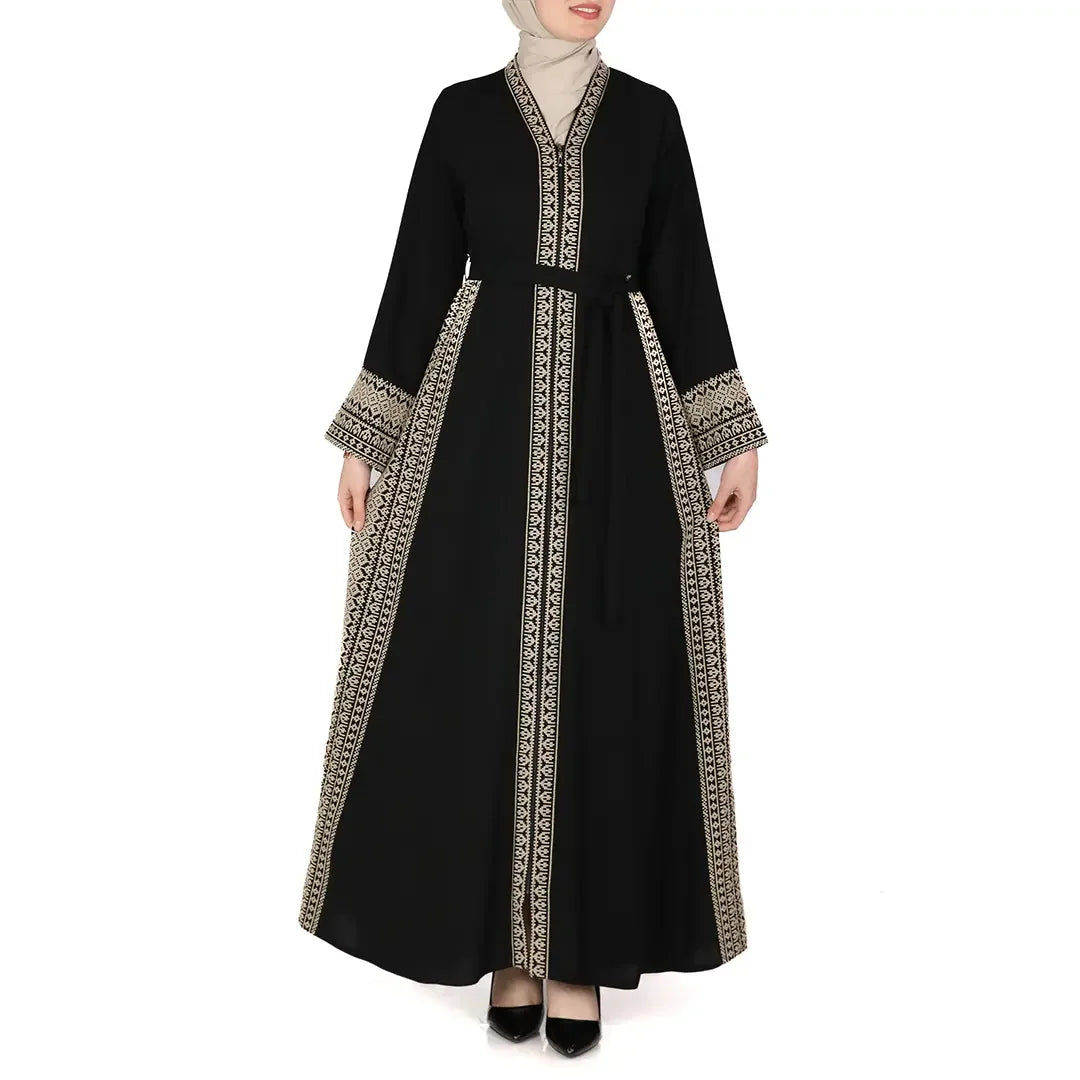 Black embroidered abaya dress with intricate beige detailing on sleeves and front panel from Palestinian Elegance