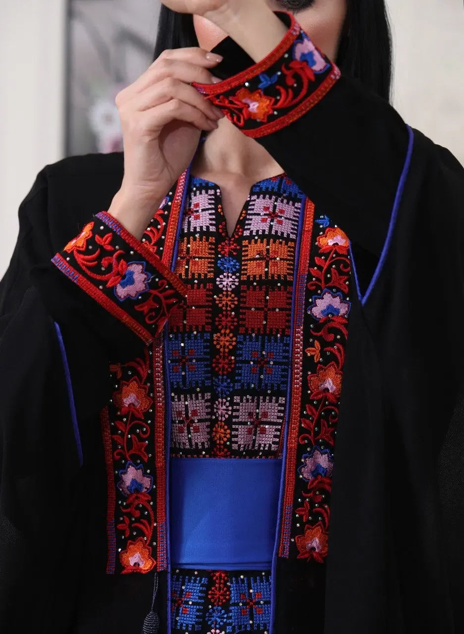 Palestinian Elegance embroidered abaya with cardigan featuring intricate colorful embroidery on black fabric