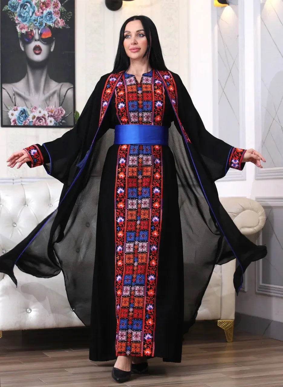 Palestinian Elegance embroidered abaya with cardigan featuring colorful traditional patterns and a blue waist belt
