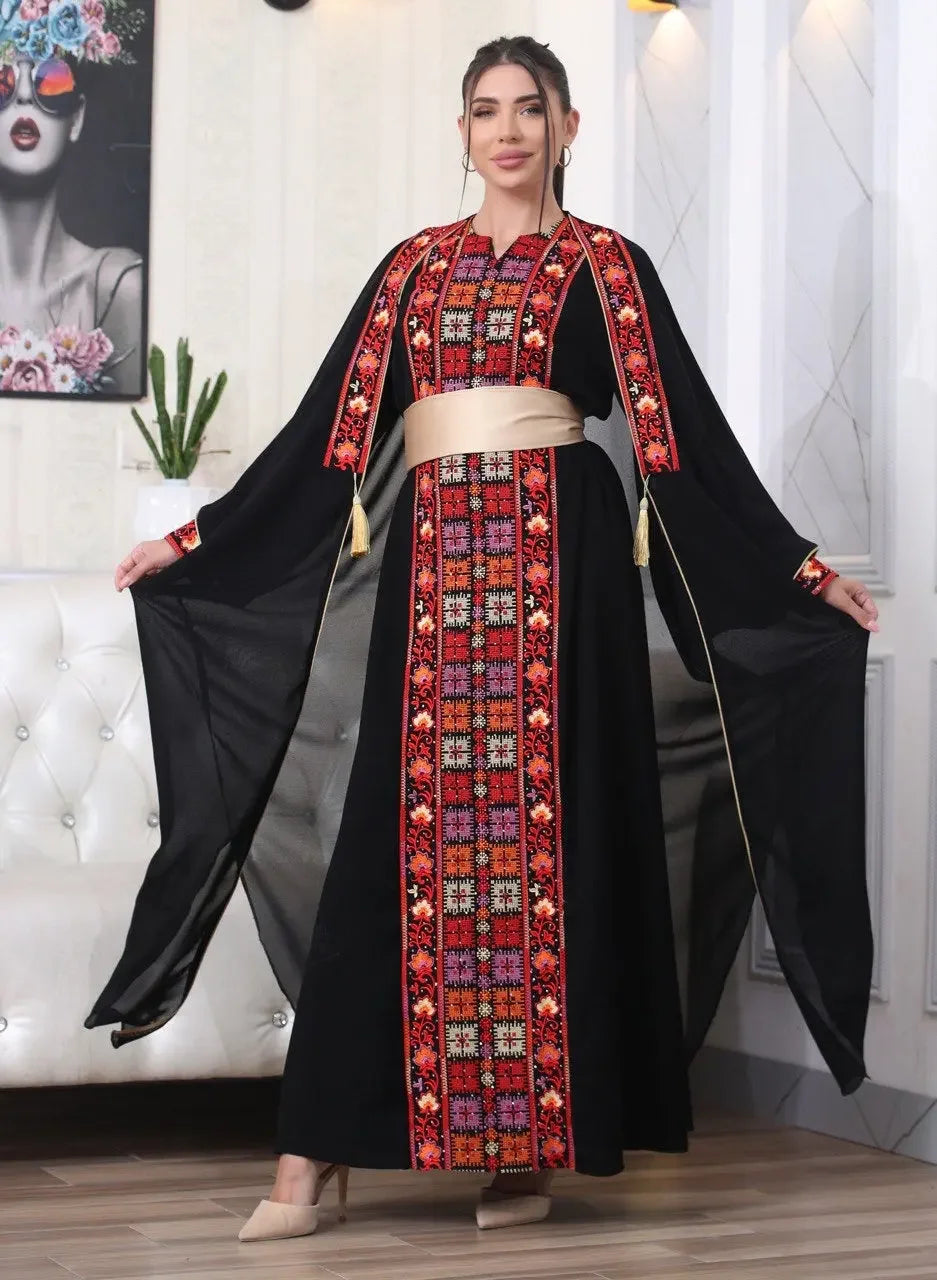 Palestinian Elegance embroidered abaya with cardigan featuring intricate red and orange designs on black kaftan