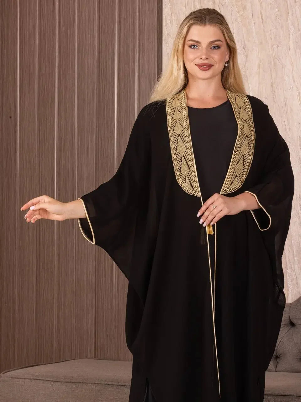 Black cardigan with gold embroidered collar designed as embroidered bisht for women by Palestinian Elegance