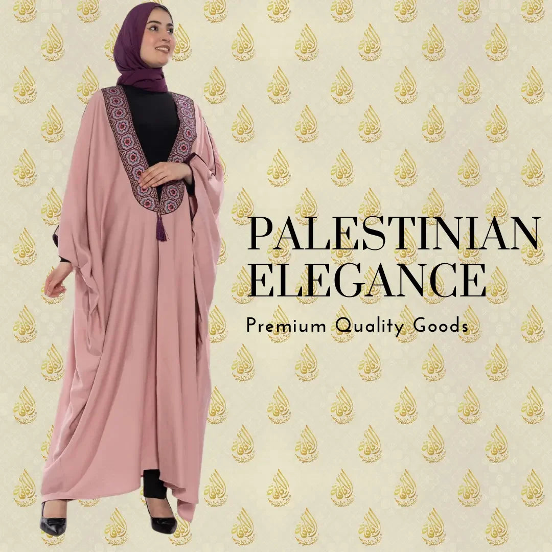 Woman wearing a pink embroidered bisht for women by Palestinian Elegance with intricate neckline embroidery
