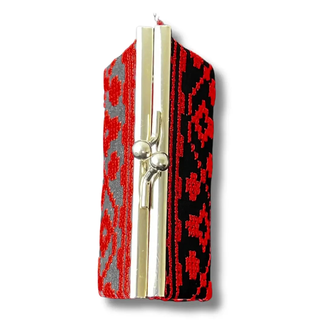 Palestinian Elegance embroidered coin wallet with traditional red and black geometric patterns and metal clasp