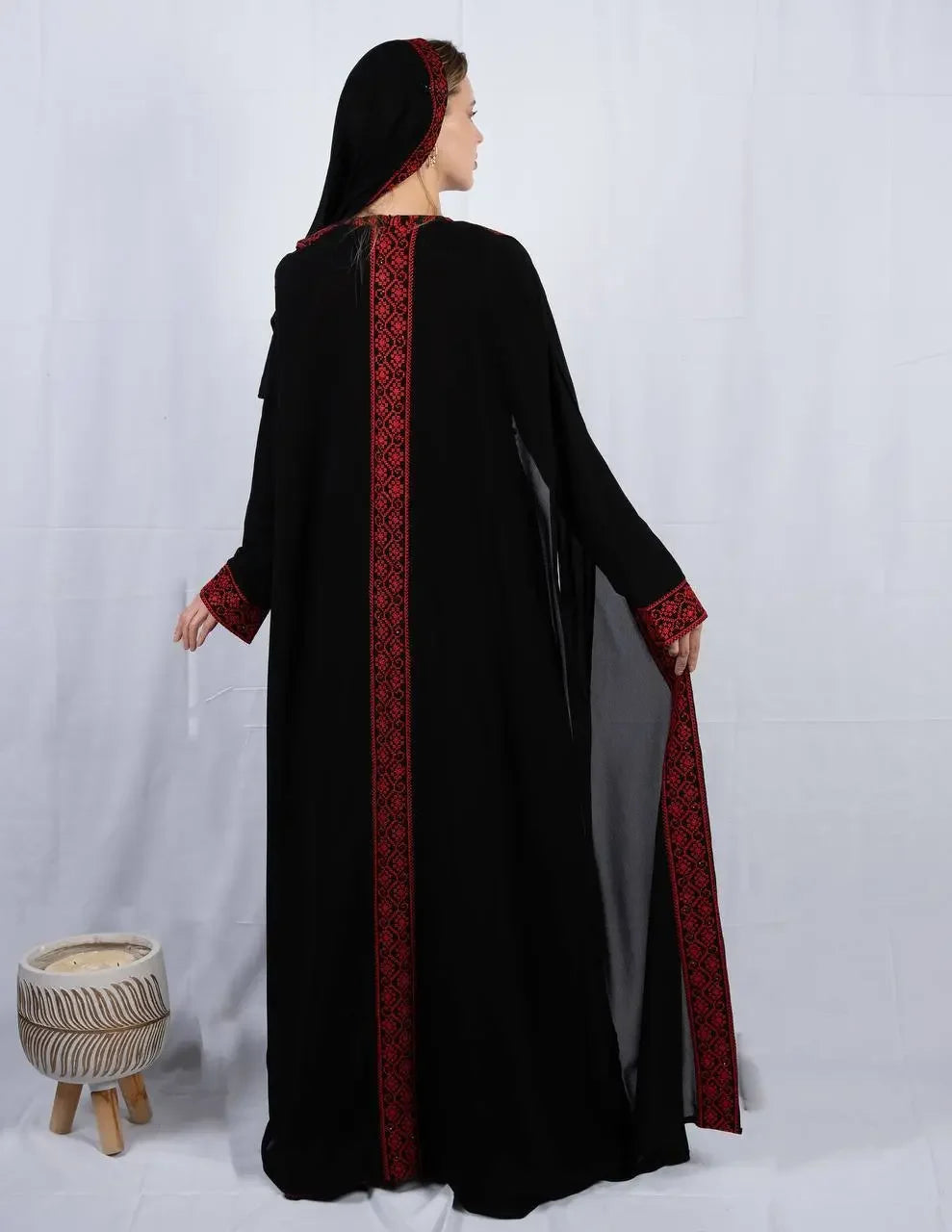 Palestinian Elegance black embroidered four piece kaftan set with red traditional patterns on back and sleeves