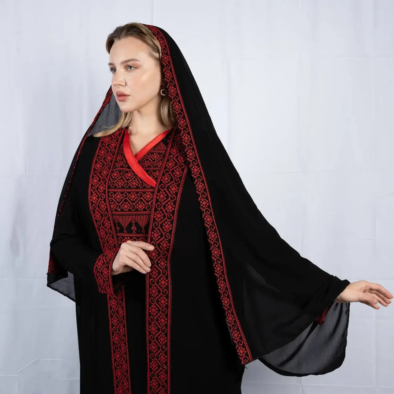 Palestinian Elegance embroidered four piece kaftan set in black with red intricate embroidery details