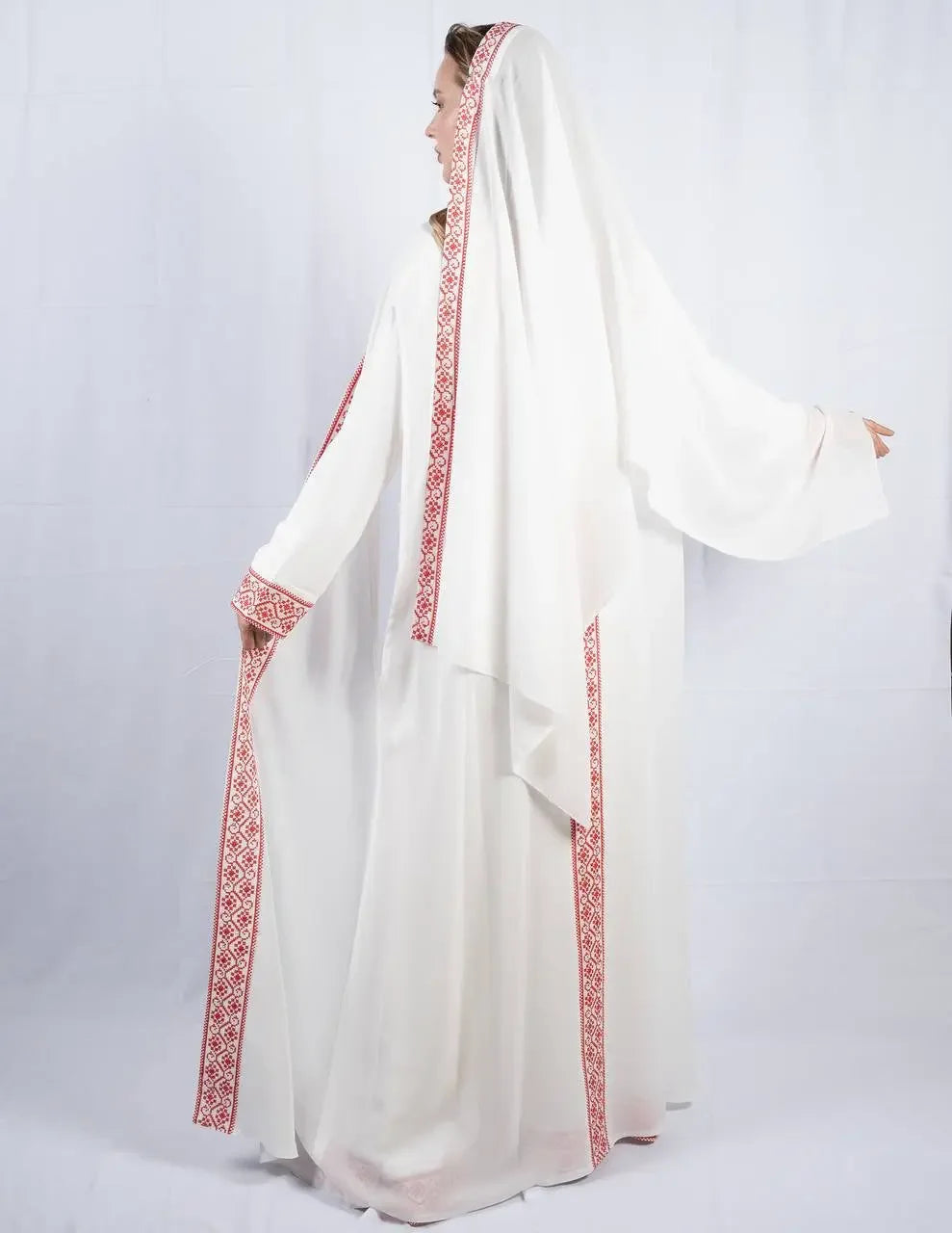 Palestinian Elegance white embroidered four piece kaftan set with red traditional embroidery on sleeves and edges